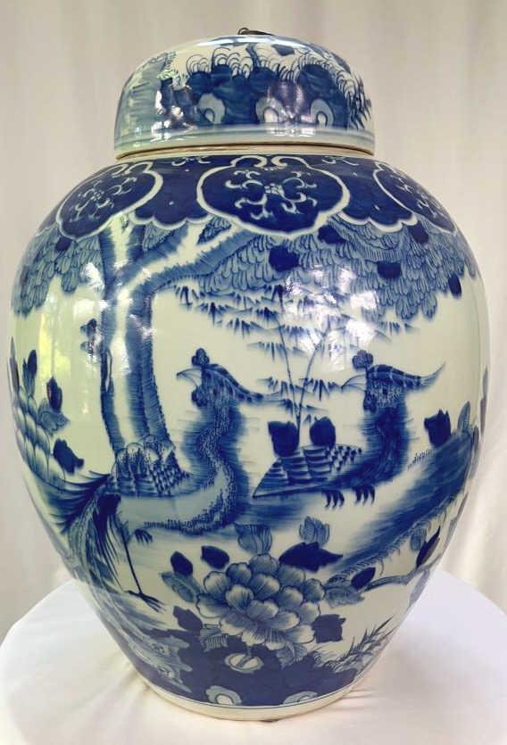 Two of Two Chinese Blue & White Ginger Jars: Phoenix birds and flowers motif with medallion collar. Approximately 13 diameter by 18 tall.