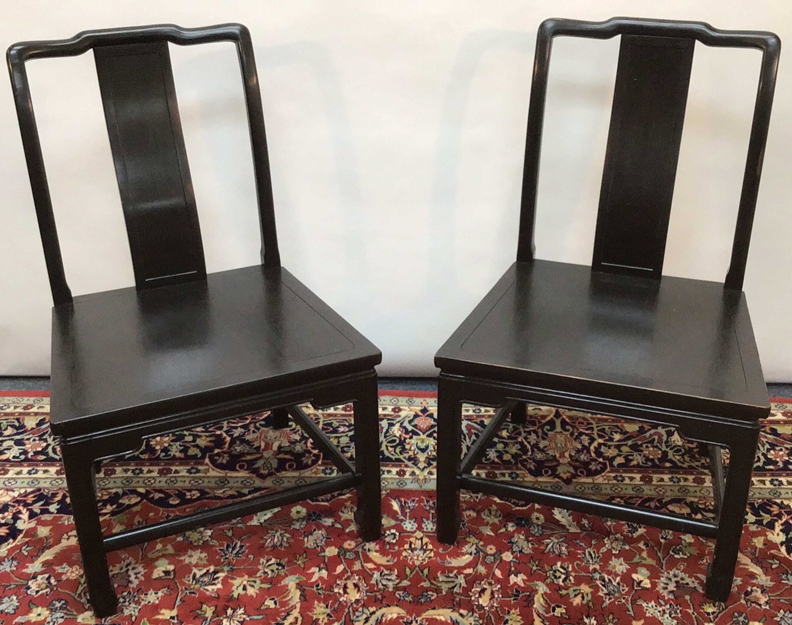 Black Chinese Chippendale Chair Pair: Manufactured by Whitlock, 22x18x34 tall at back.