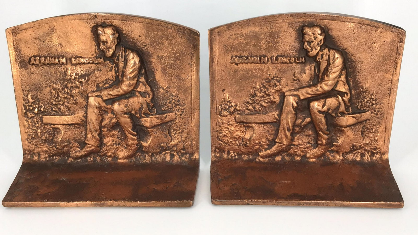 Pair of Bronze Abraham Lincoln Bookends: copper painted, foundry mark. Approximately 5.5 x 5 tall.