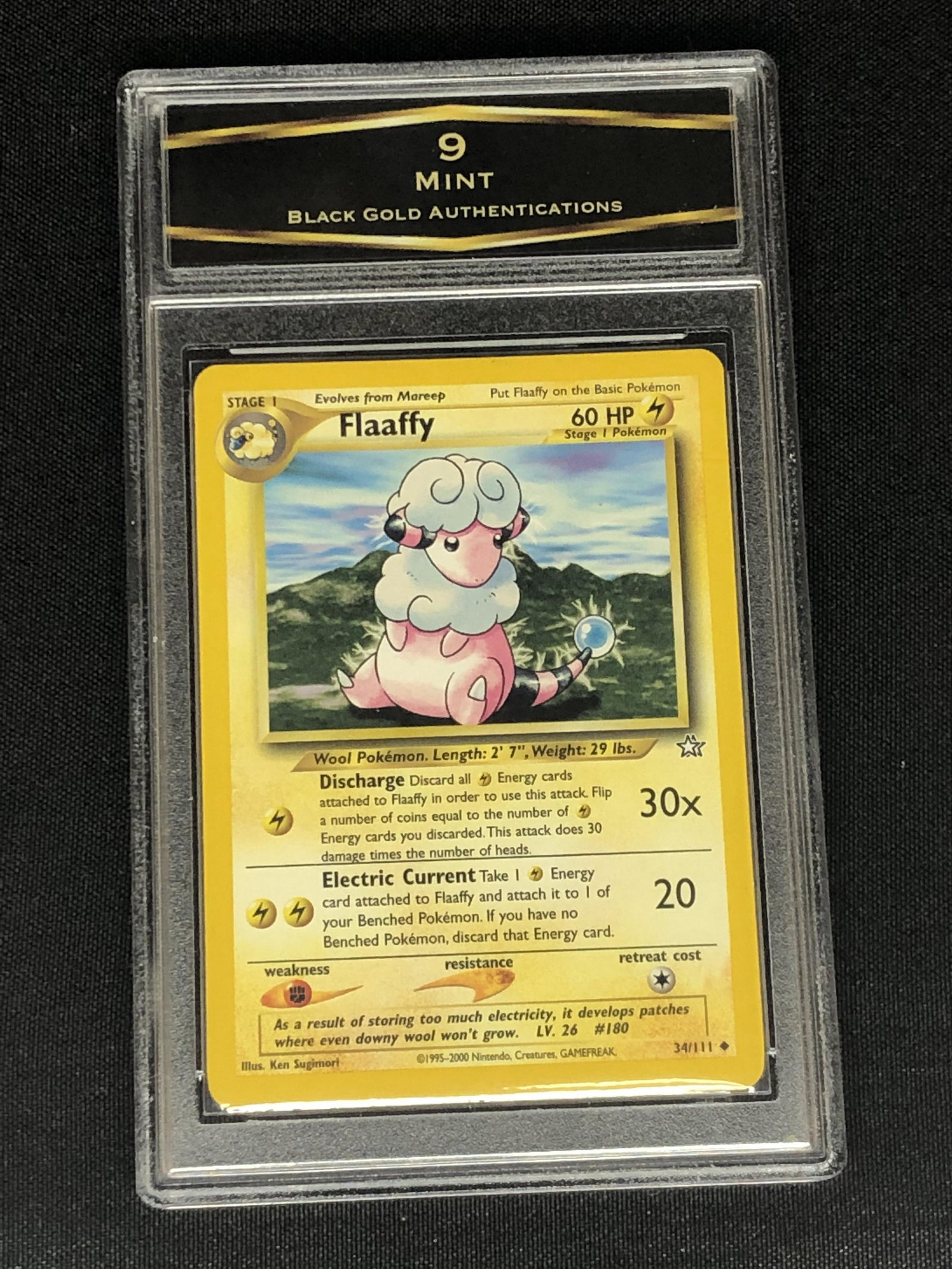 Vintage Neo Genesis Flaffy Pokemon Card Graded BGA 9: Vintage Neo Genesis Flaffy Pokemon Card Graded BGA 9