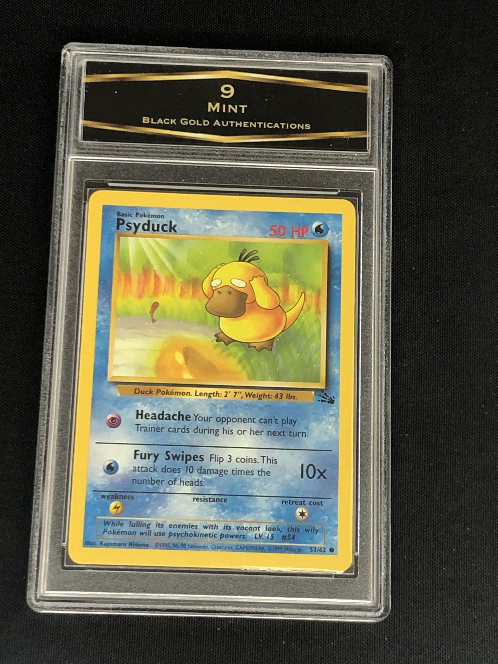 Vintage Fossil Set Psyduck Graded BGA 9 (1 of 1)