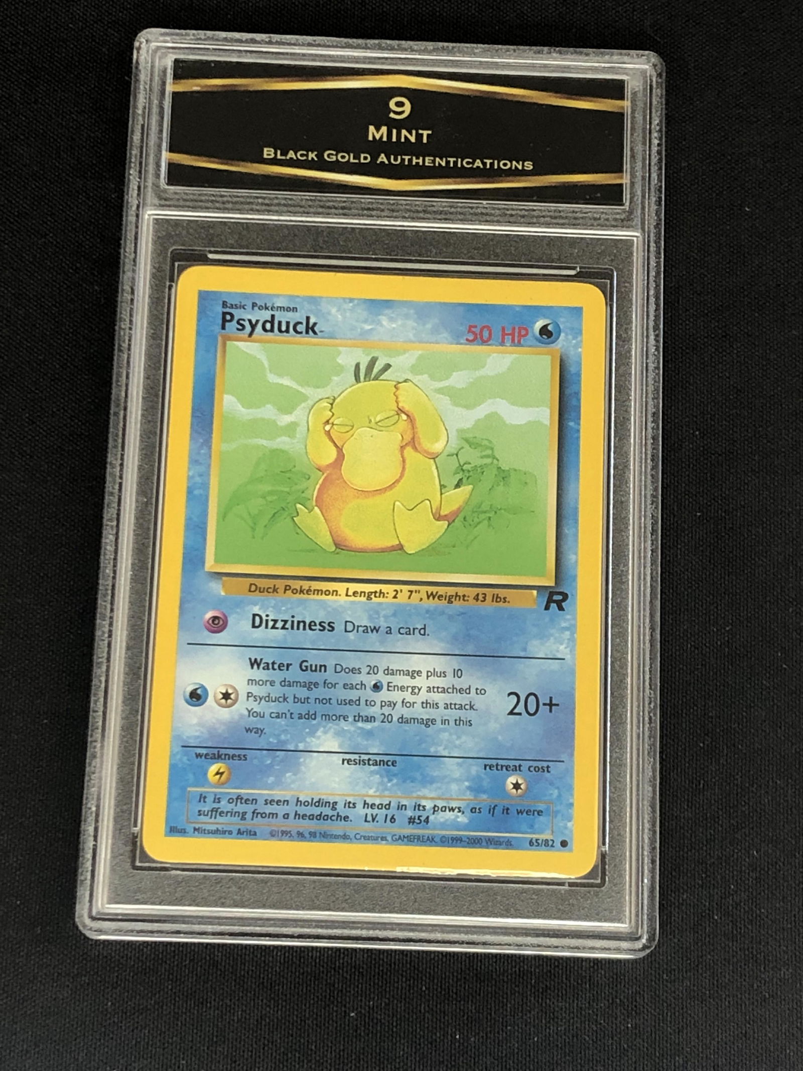 Vintage Team Rocket's Psyduck Graded BGA 9: Vintage Team Rocket's Psyduck Graded BGA 9