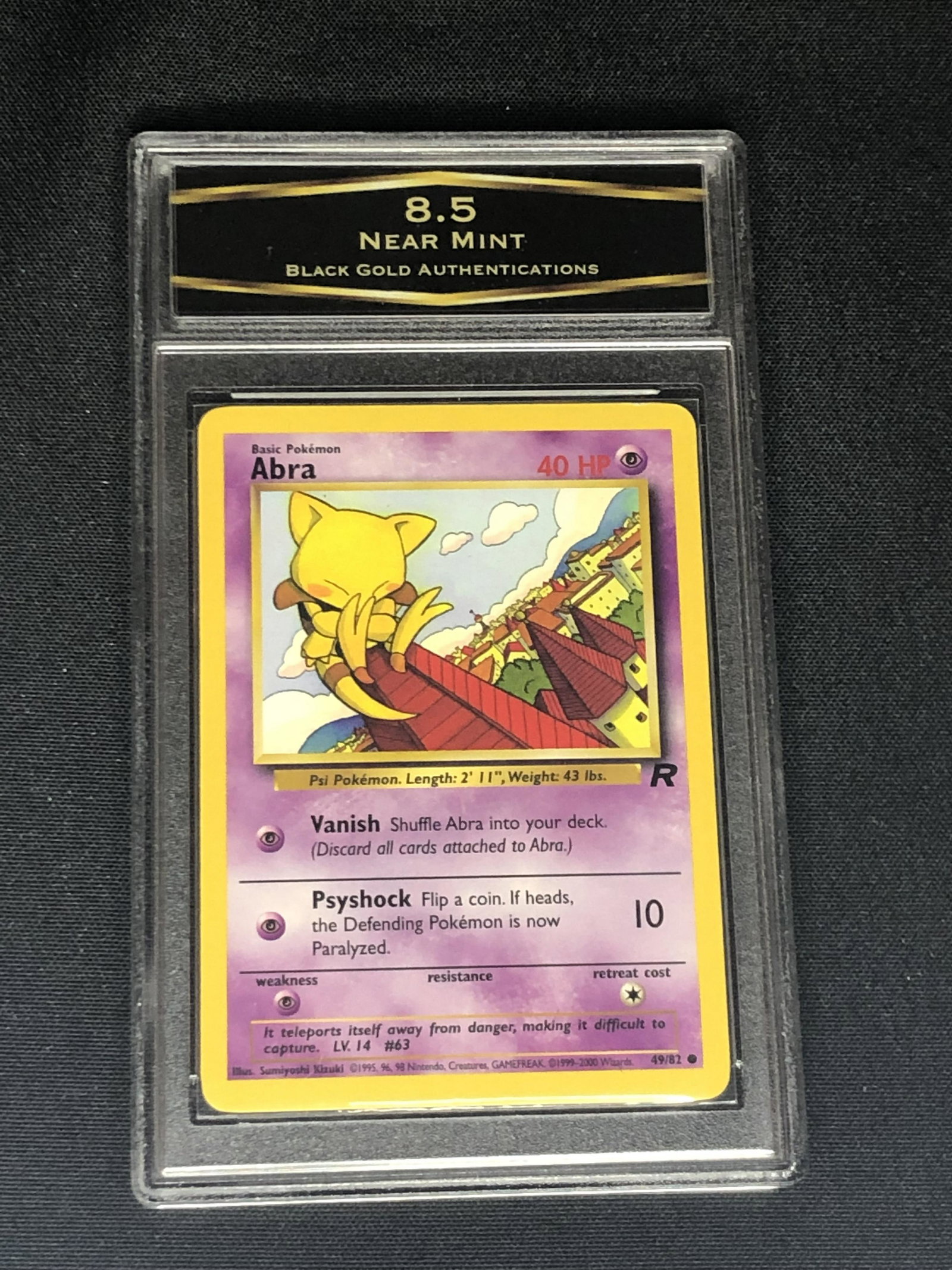 Vintage Team Rocket's Abra Pokemon Card Graded BGA 8.5: Vintage Team Rocket's Abra Pokemon Card Graded BGA 8.5