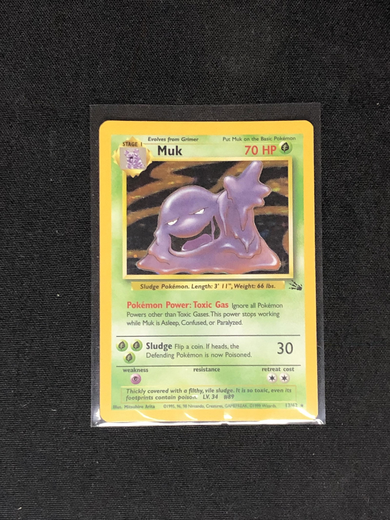 Muk Holo Pokemon Card Single- in heavily played condition: Muk Holo Pokemon Card Single- in heavily played condition