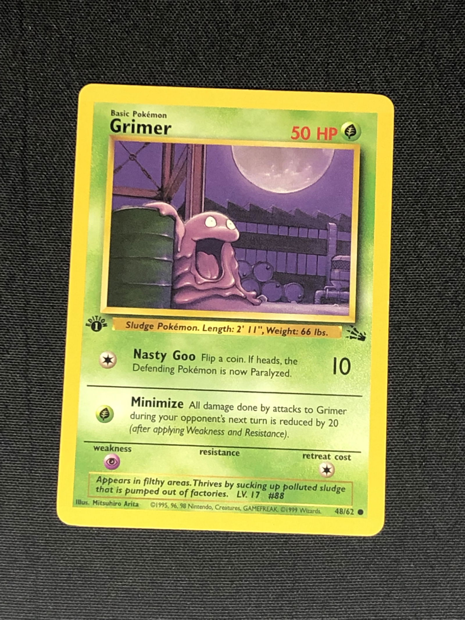 1st Edition Fossil Set Grimer Pokemon Card - Moderately Played Condition (1 of 1)