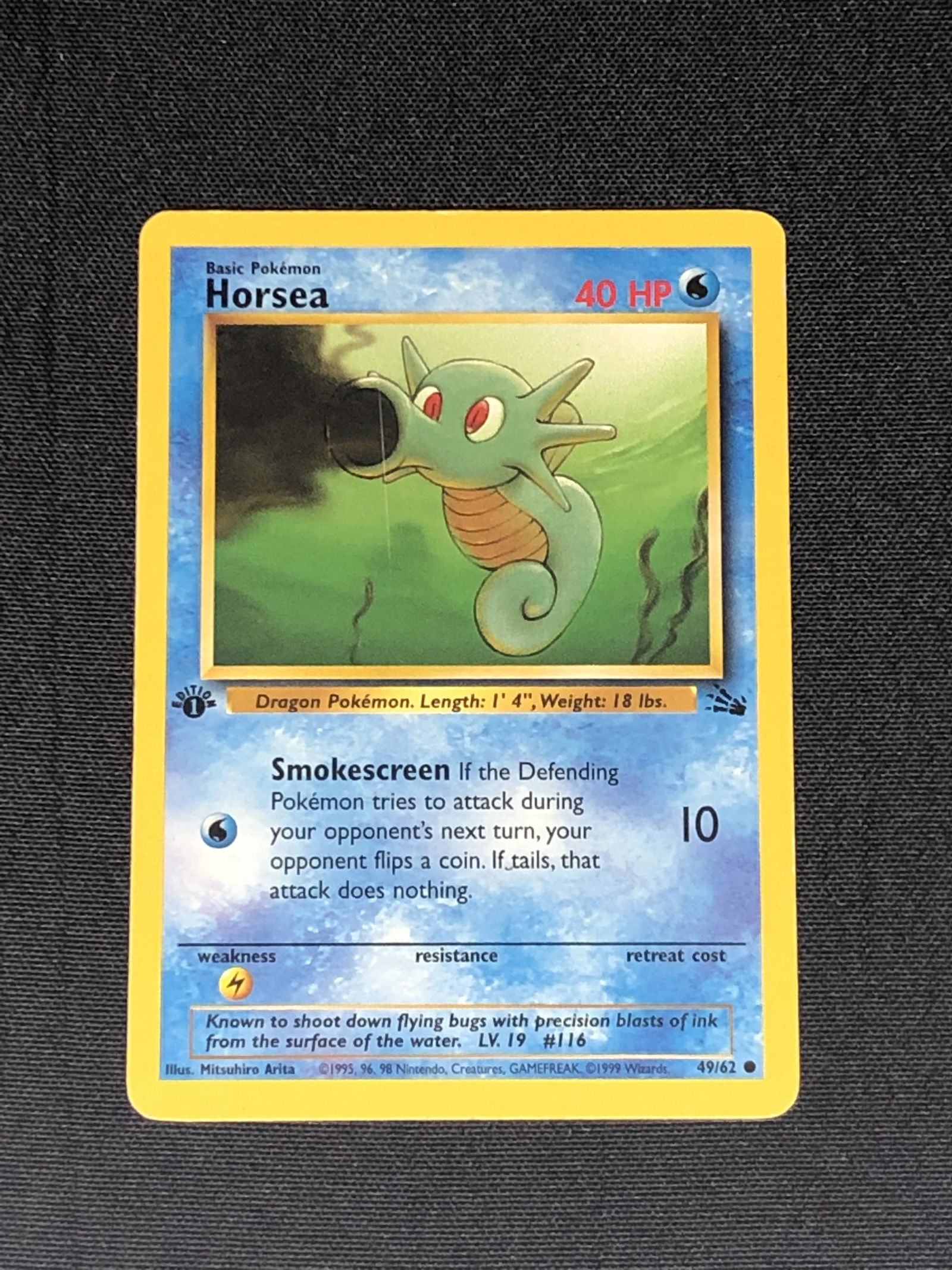 1st Edition Fossil Set Horsea Pokemon Card - Moderately Played Condition: 1st Edition Fossil Set Horsea Pokemon Card - Moderately Played Condition
