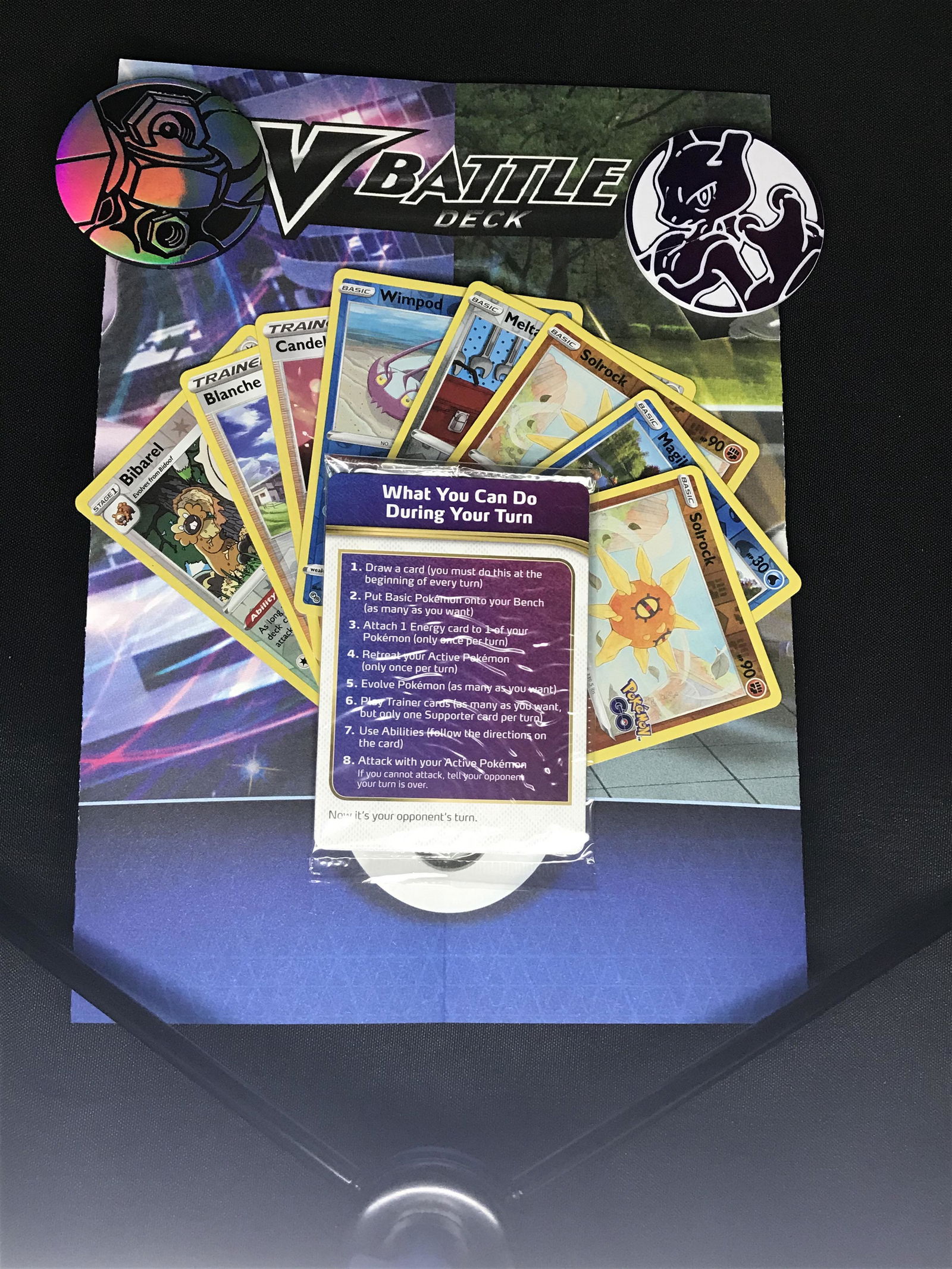 Lot of Pokemon reverse holo cards, tokens, and V Battle mat (1 of 1)
