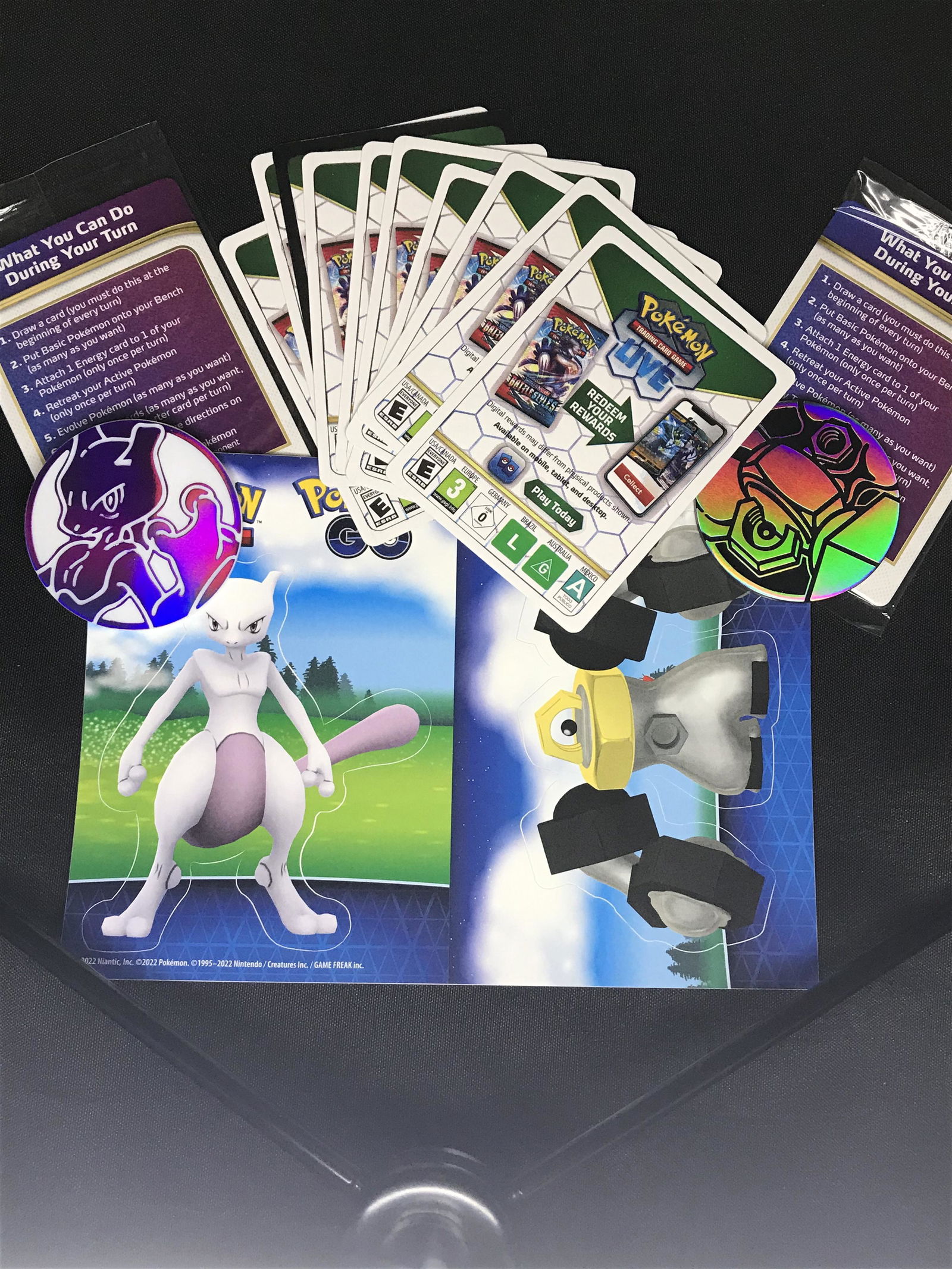 Lot of Pokemon code cards, tokens, and stickers (1 of 1)