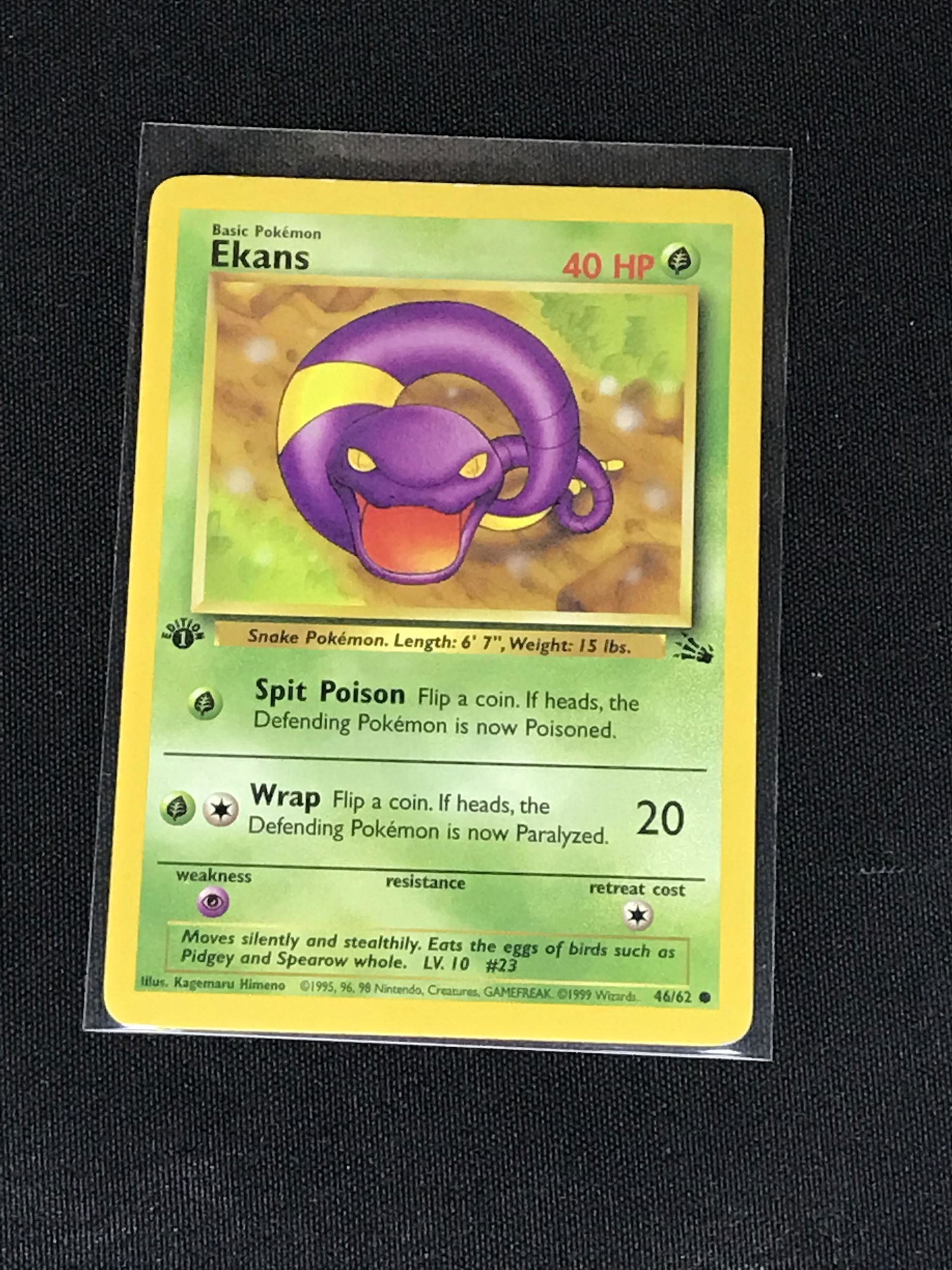Vintage 1st Edition Fossil Ekans Pokemon single - moderately played (1 of 1)