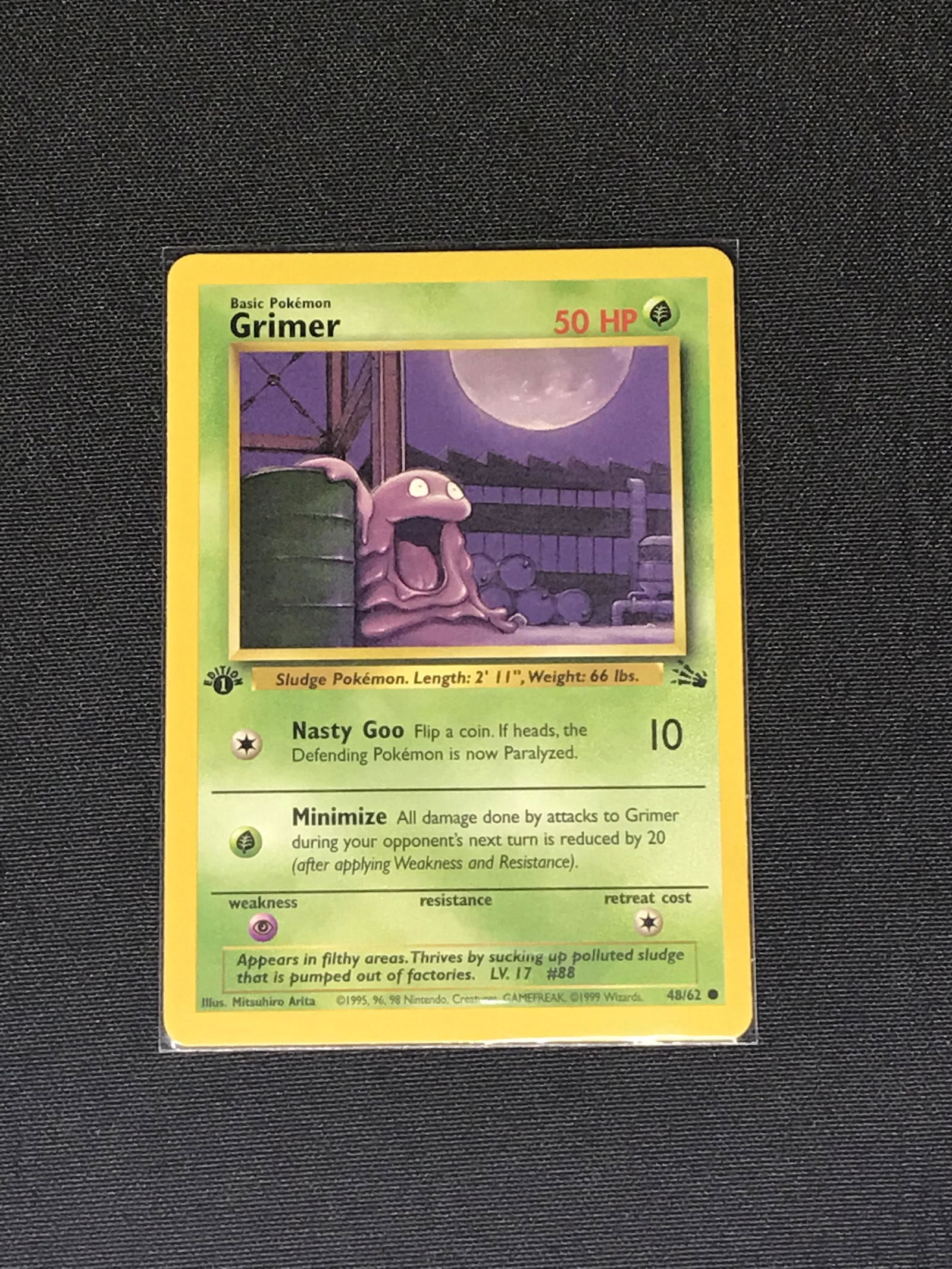 1st Edition Fossil Grimer Pokemon single - moderately played (1 of 1)