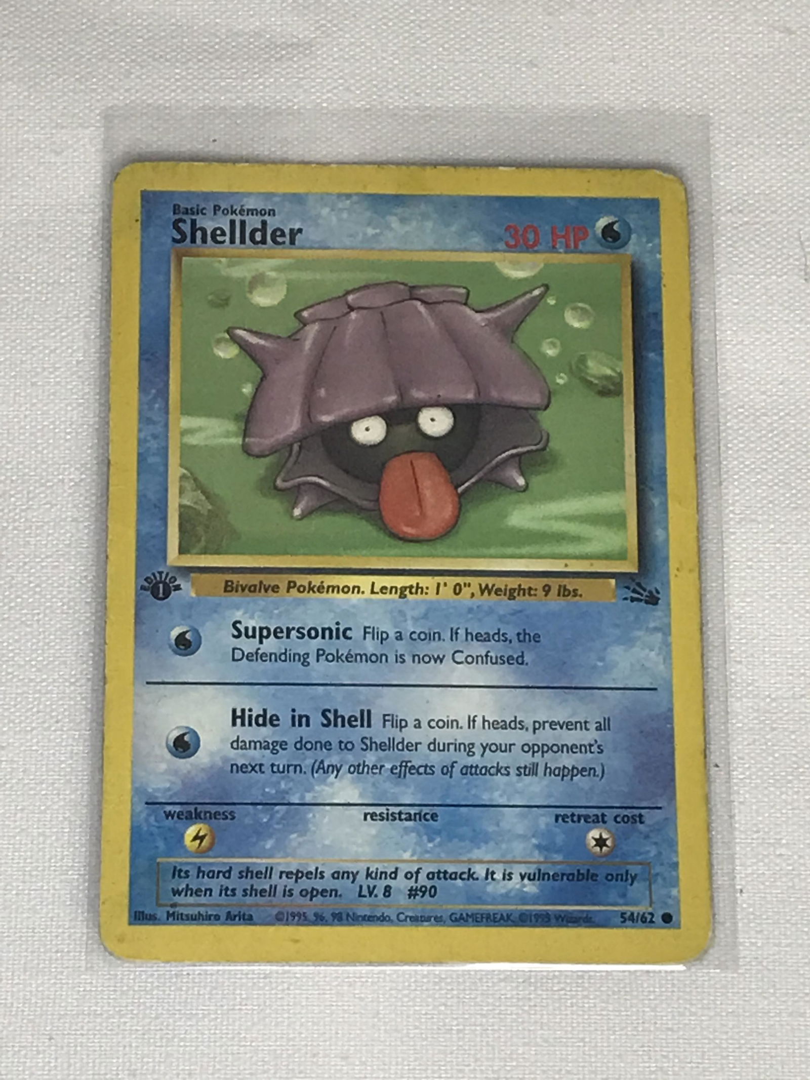 1st Edition Fossil Shellder Pokemon single - moderately played (1 of 1)
