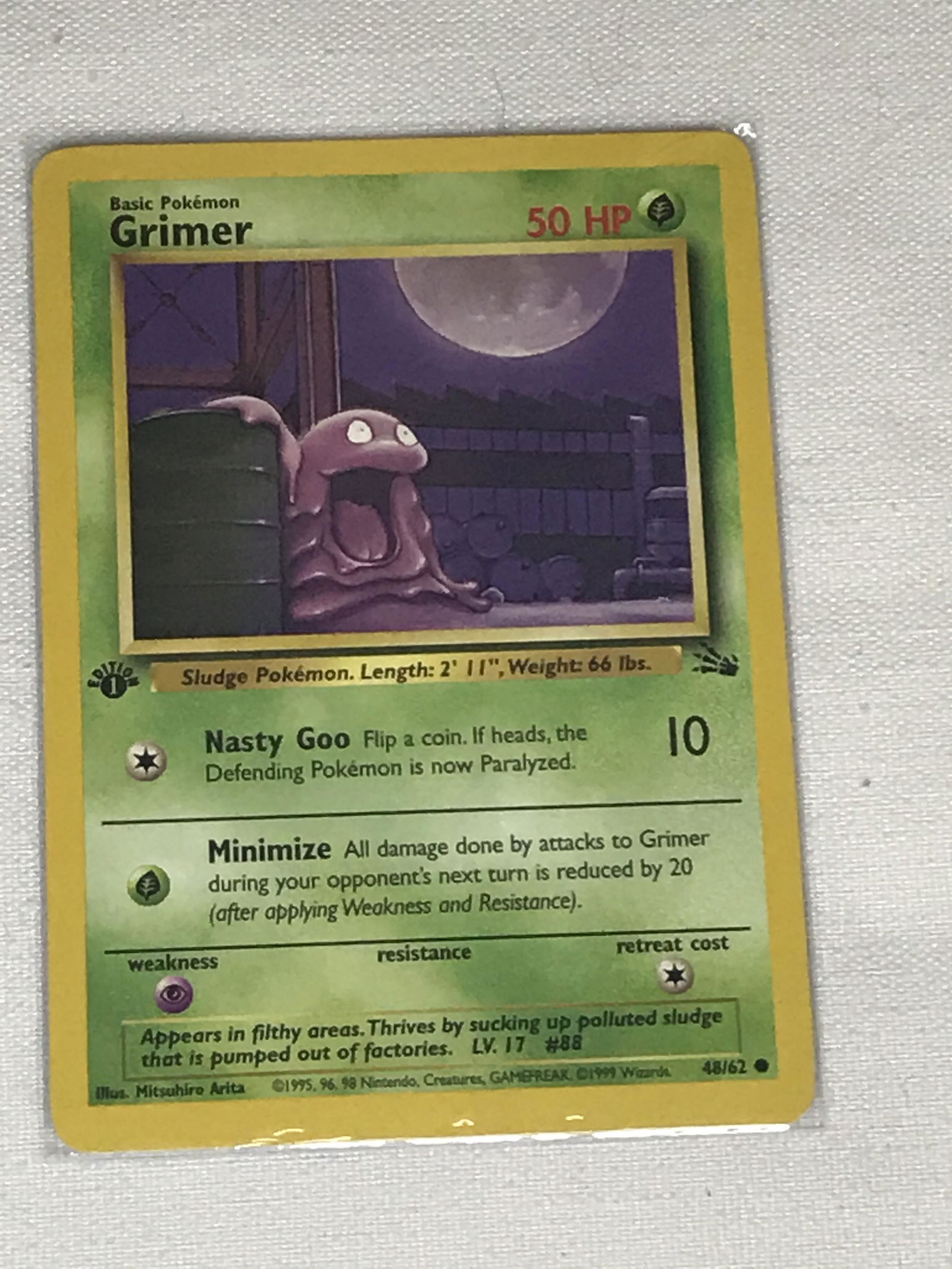 1st Edition Fossil Grimer Pokemon single - moderately played (1 of 1)