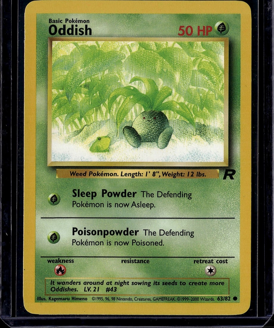 Oddish 63/82 Pokemon Base Set 1999 Vintage Card: This is an original Oddish Pokemon trading card from the iconic Base Set, released in 1999. Card #63/82 features the classic weed Pokemon artwork by Kagemaru Himeno with vibrant green coloring and per