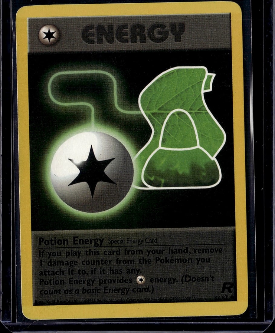 Potion Energy Base Set Pokemon Card Special Energ: This is an authentic Potion Energy special energy card from the vintage Pokemon Base Set, released in 1999. The card features iconic green leaf artwork with a glowing orb design, characteristic of cla