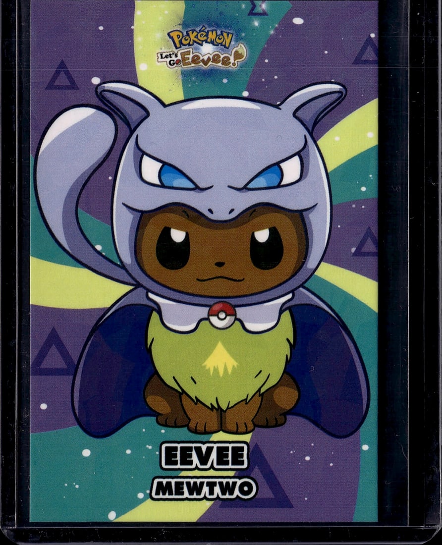 Pokemon Let's Go Eevee Mewtwo Card - Collectible: This is an official Pokemon Let's Go Eevee promotional card featuring Mewtwo wearing an Eevee costume. The card showcases vibrant artwork with a colorful gradient background in purple, yellow, and