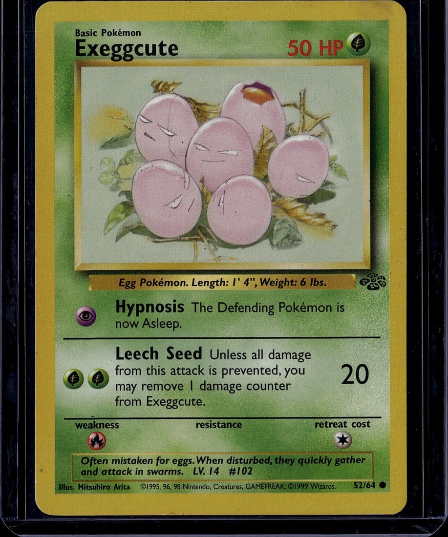 1999 Pokemon Base Set Exeggcute #52/64 Card - Cla: This is an authentic 1999 Pokemon Trading Card Game Base Set Exeggcute card (#52/64), featuring the iconic Egg Pokemon illustrated by Mitsuhiro Arita. The card displays Exeggcute's six rounded pink