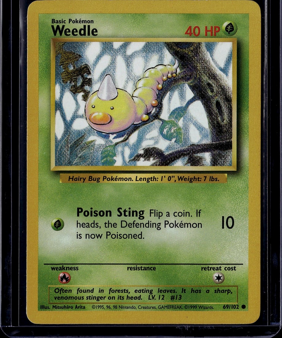 1999 Pokemon Base Set Weedle #69/102 Near Mint Ca: This is an authentic 1999 Pokemon Base Set Weedle card (#69/102), featuring the iconic Hairy Bug Pokemon with its characteristic venomous stinger. The card displays Weedle's classic artwork by Mitsuhi