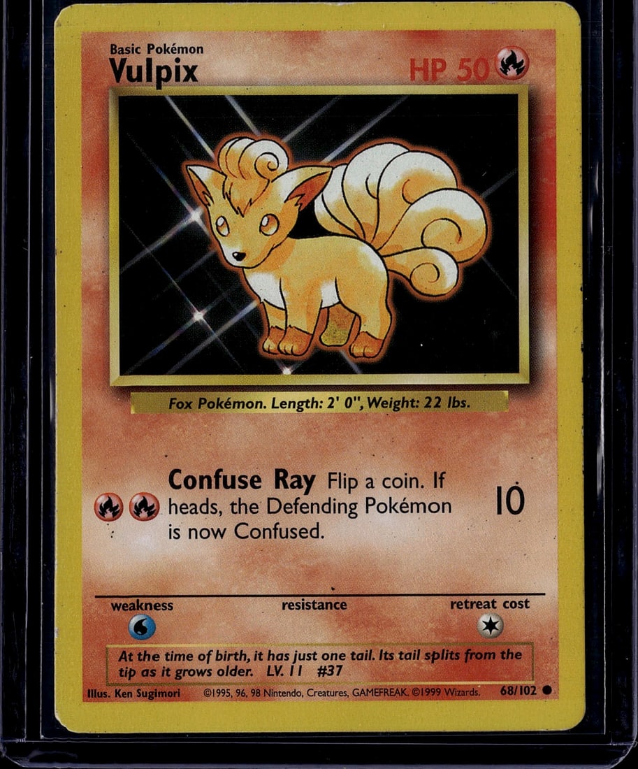 1999 Pokemon Base Set Vulpix #68/102 Card - Fox P: This is an original 1999 Pokemon Trading Card Game Base Set Vulpix card (#68/102), featuring the iconic Fire-type Fox Pokemon. Illustrated by Ken Sugimori, this Basic Pokemon card displays Vulpix with