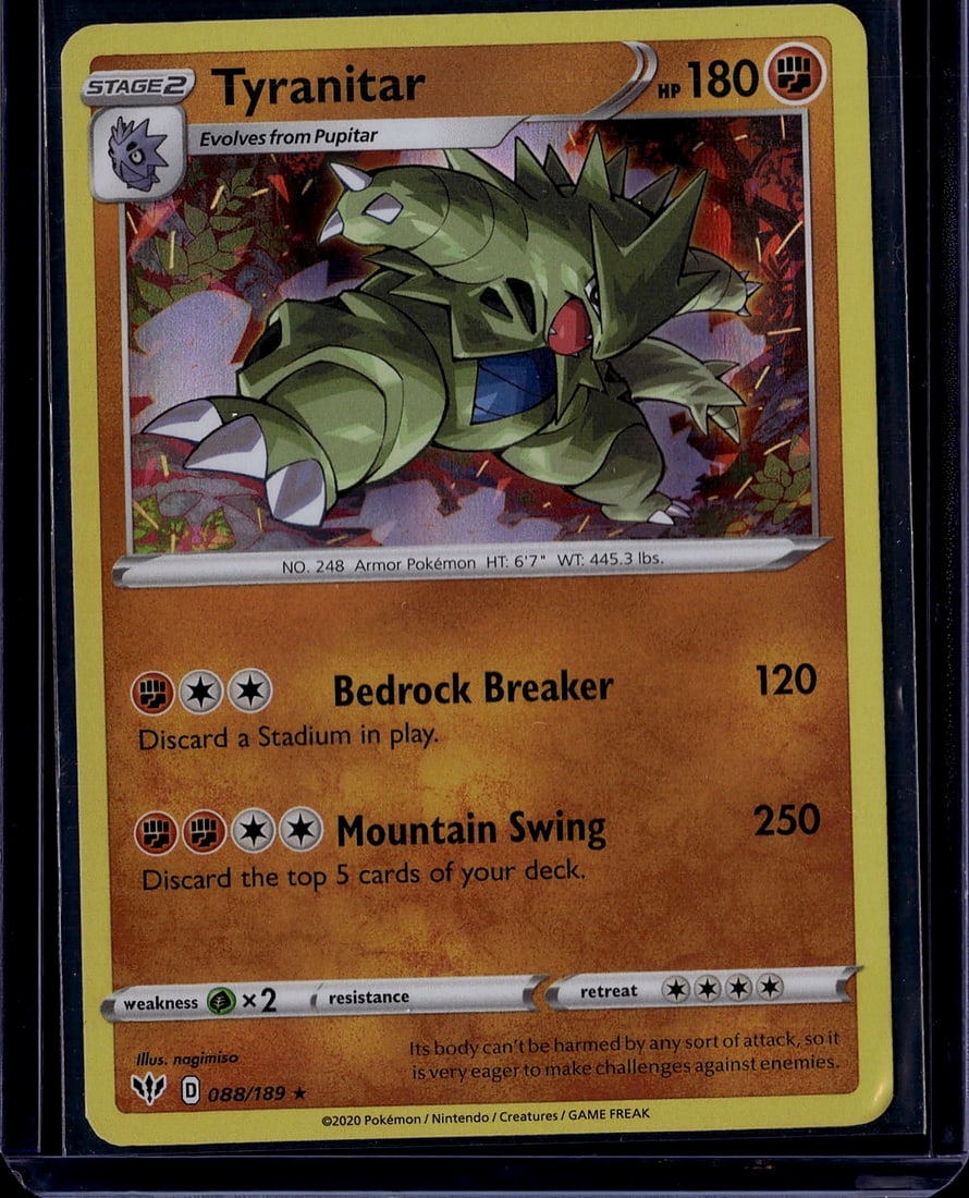 Tyranitar Stage 2 Pokemon Card 088/189 Sword & Sh: This is a raw Tyranitar Stage 2 Pokemon card from the 2020 Sword & Shield expansion set. Card number 088/189, this Armor Pokemon features 180 HP and displays the iconic green-armored dinosaur design. 