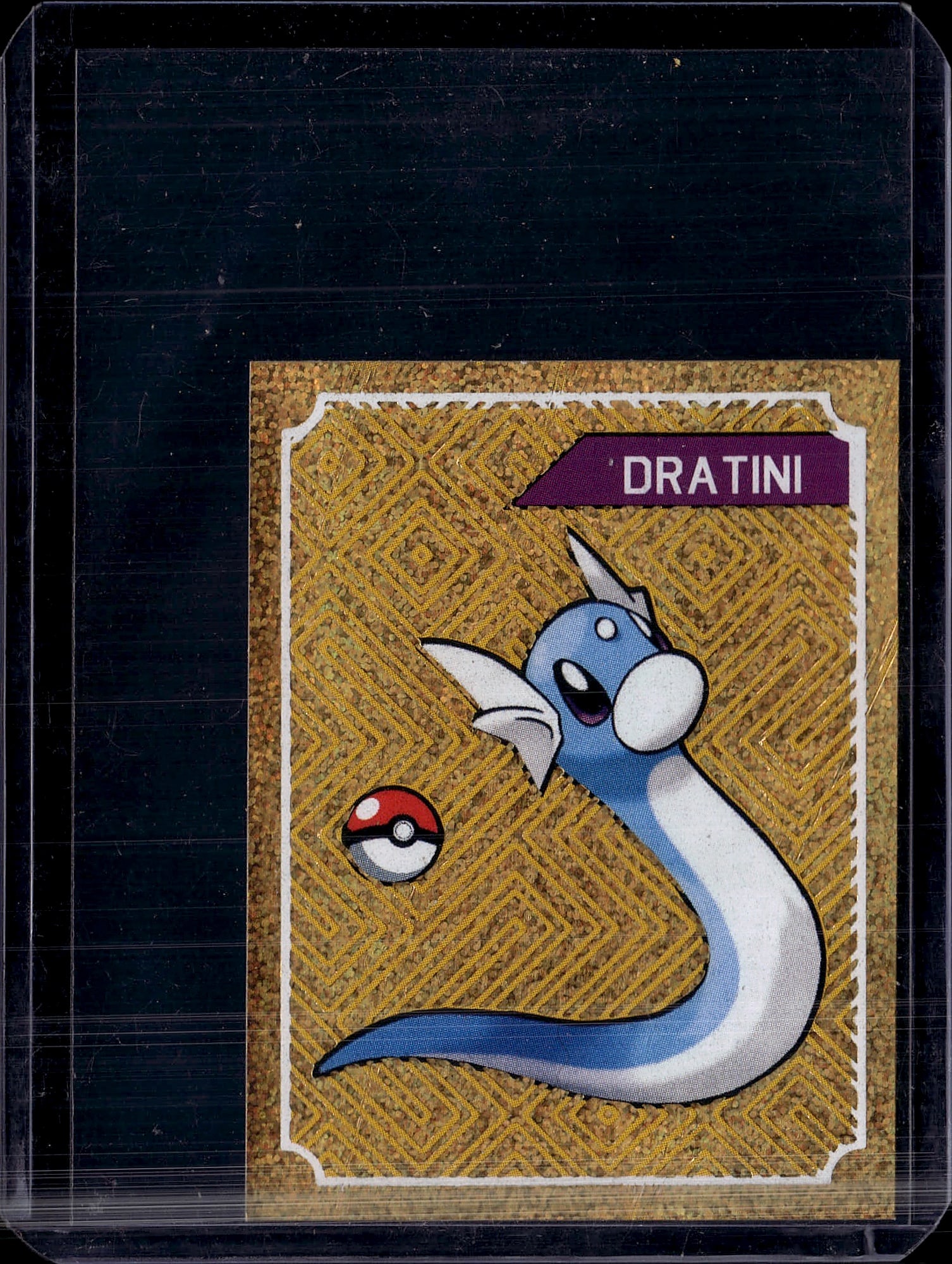 1999 Pokemon Base Set Dratini #26 Card Near Mint: This is a vintage Dratini Pokemon trading card from the iconic Base Set era. Dratini is a Water-type Pokemon known for its serpentine appearance and role as the pre-evolution of Dragonair and Dragonit