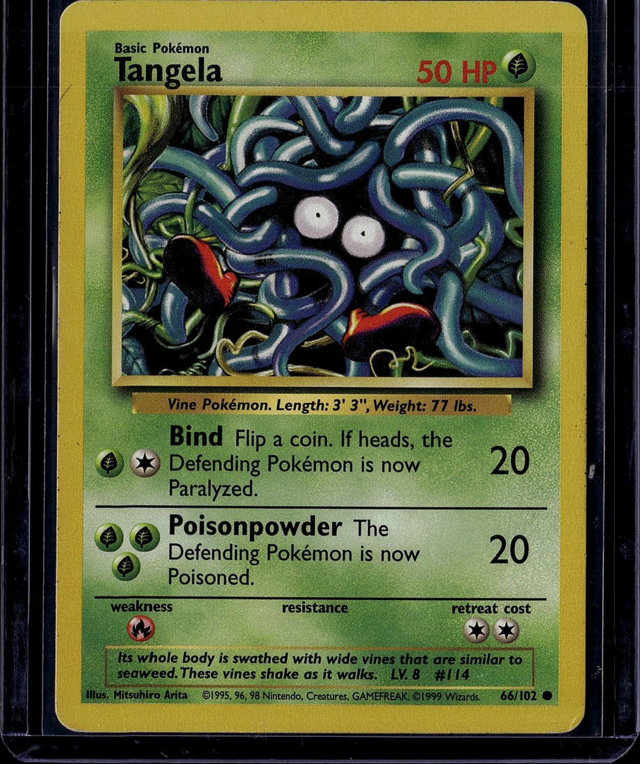 Tangela Base Set 66/102 1999 Pokemon Card Near Mi: This is an original Tangela Pokemon Trading Card from the Base Set, released in 1999 by The Pokemon Company and illustrated by Mitsuhiro Arita. Card #66/102 features Tangela, a Grass-type Basic Pokemo