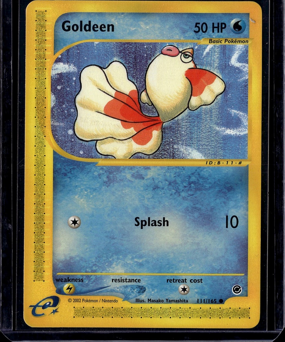 Goldeen 111/165 Expedition Base Set 2002 Pokemon: This is a vintage Goldeen Pokemon trading card from the 2002 Expedition Base Set, card number 111/165. It features the classic water-type Pokemon with its distinctive red and cream coloring,
