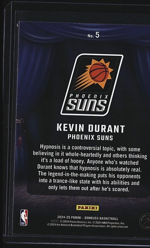 2024 Panini Donruss Kevin Durant #5 Phoenix Suns: 2024 Panini Donruss Kevin Durant #5 Phoenix Suns basketball card. Features Durant in a white Suns jersey dribbling the basketball against a dark background. The card displays the Donruss branding on