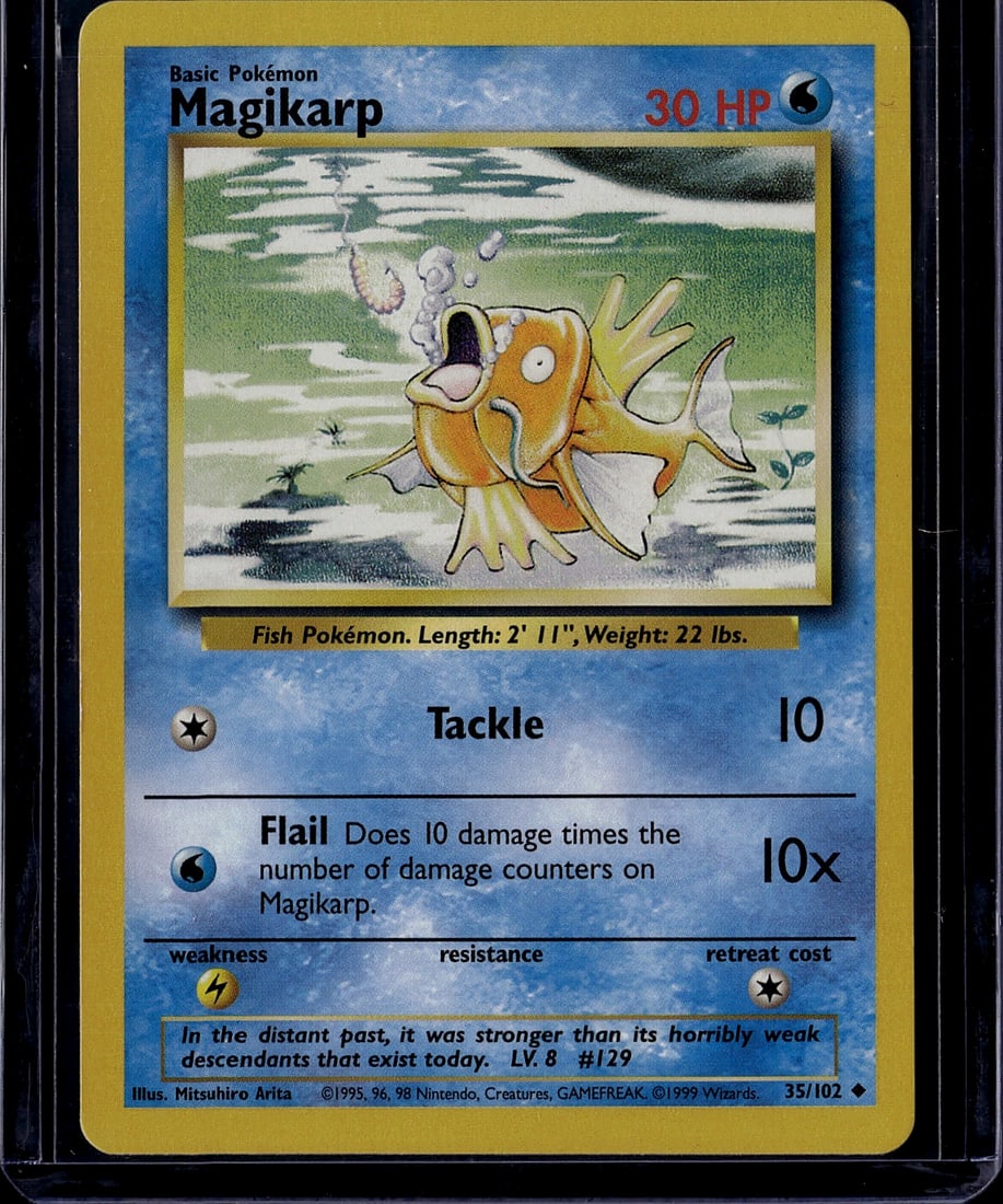 1999 Pokemon Base Set Magikarp 35/102 Very Good C: This is an original 1995 Pokemon Trading Card Game Base Set Magikarp card (#35/102), featuring the iconic Water-type Fish Pokemon illustrated by Mitsuhiro Arita. The card displays Magikarp's classic a