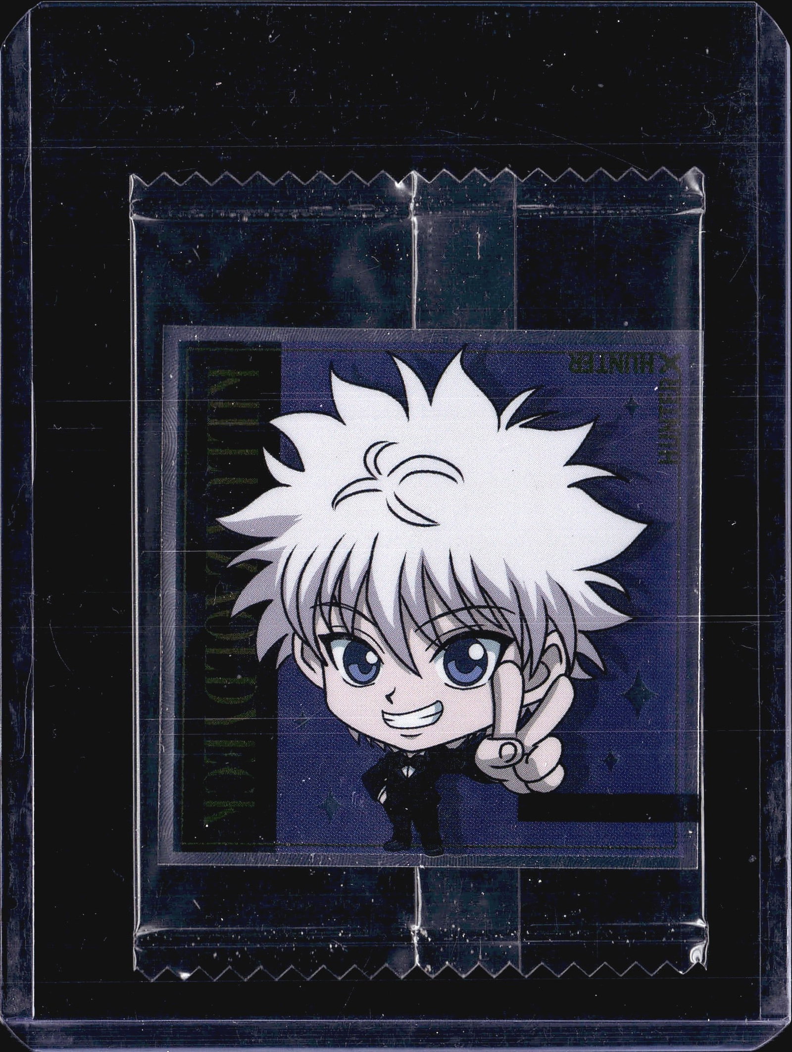 Bandai Hunter x Hunter Wafer Sticker HH6-15 Killu: This listing features a sealed Bandai Hunter x Hunter promo sticker pack showcasing Killua Zoldyck in chibi style, card number HH6-15 [N]. The front displays a colorful chibi illustration of Killua in