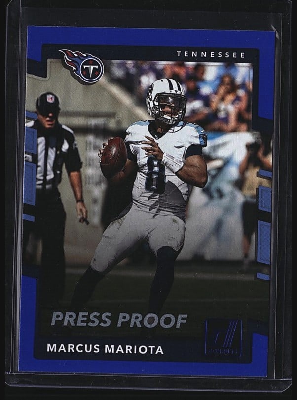 2017 Panini Donruss Marcus Mariota #214 Press Pro: 2017 Panini Donruss Marcus Mariota Tennessee Titans #214 Press Proof football card. This is an ungraded raw single in mint condition. The card features Mariota in action during a game, with the