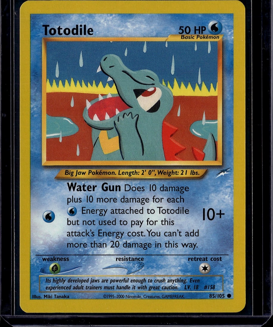 Totodile #158 Neo Genesis Pokemon Card Raw 2000: This is a raw Totodile Pokemon card from the Neo Genesis set, released in 2000. Card #158 features the iconic water-type basic Pokemon with its characteristic big jaw design. The card displays