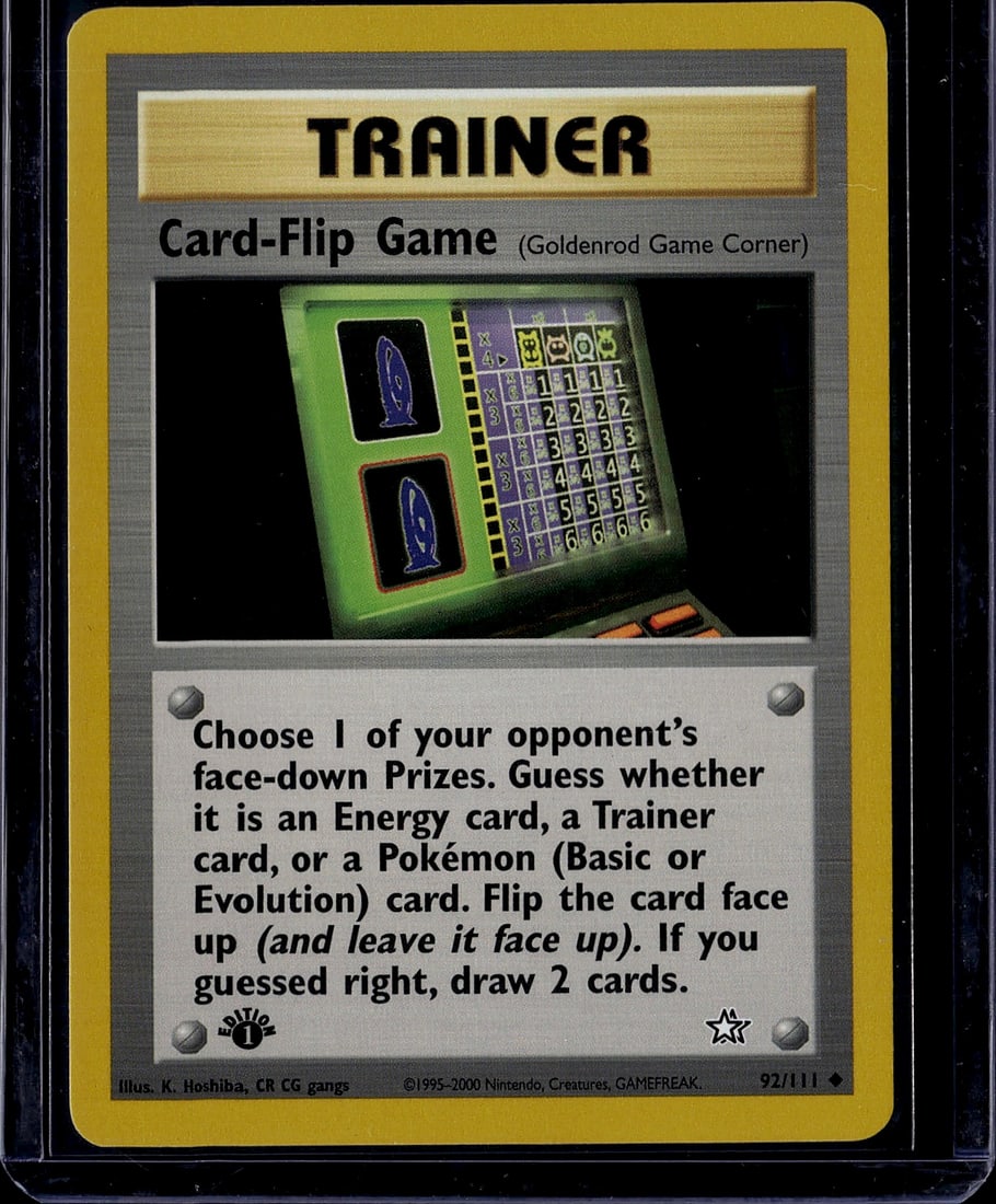 Pokemon Gym Heroes Card-Flip Game Trainer 92/111: This is an authentic Pokemon Trading Card Game Trainer card from the Gym Heroes set, released by The Pokemon Company in 2000. The Card-Flip Game is a unique Trainer card that depicts a handheld electr
