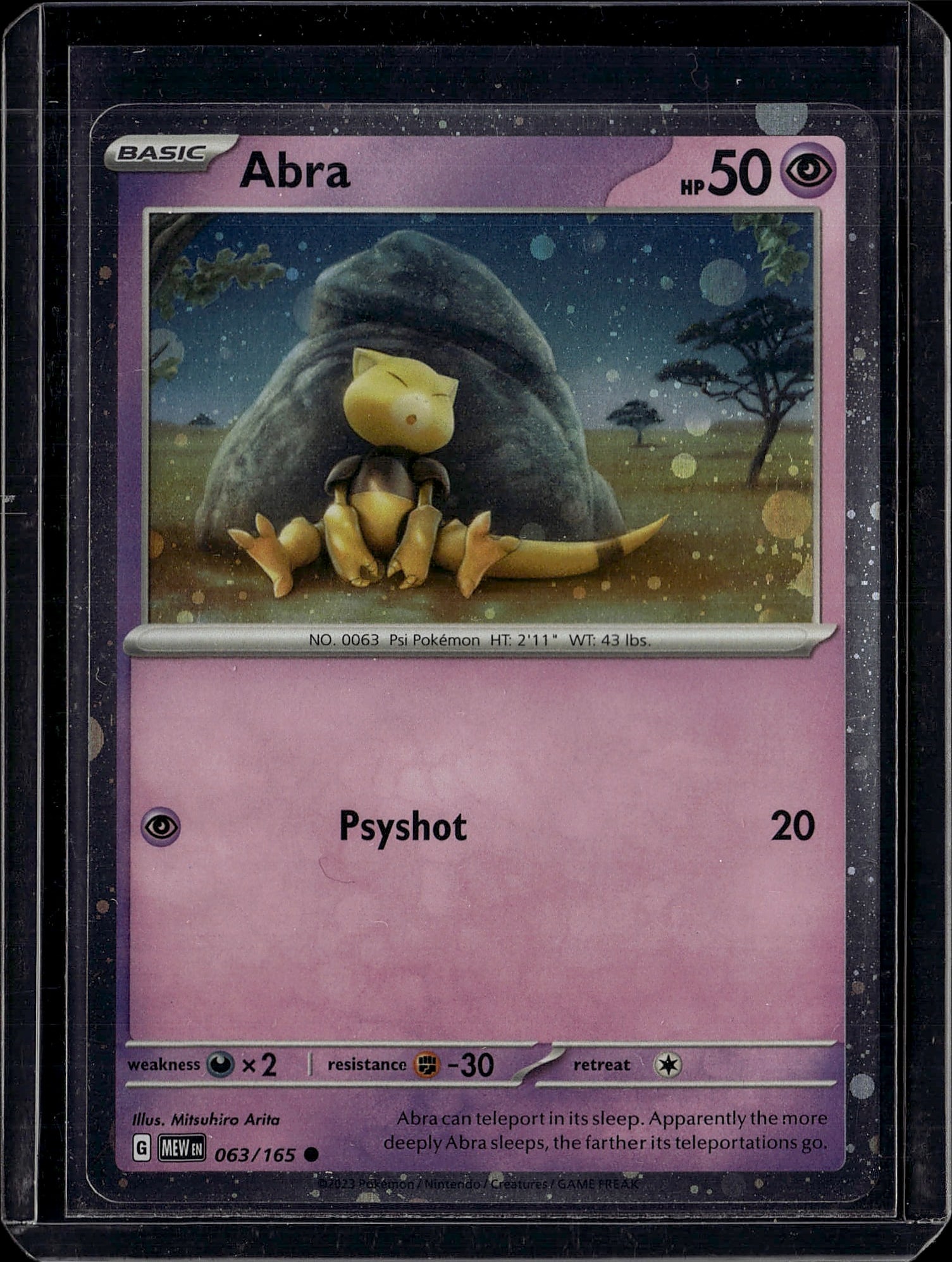 Abra 063/165 Scarlet & Violet Pokemon Card - Psyc: This is an ungraded Abra Pokemon trading card from the Scarlet & Violet set, card number 063/165. The card features vibrant artwork by Mitsuhiro Arita depicting Abra resting beneath a large rock in a 