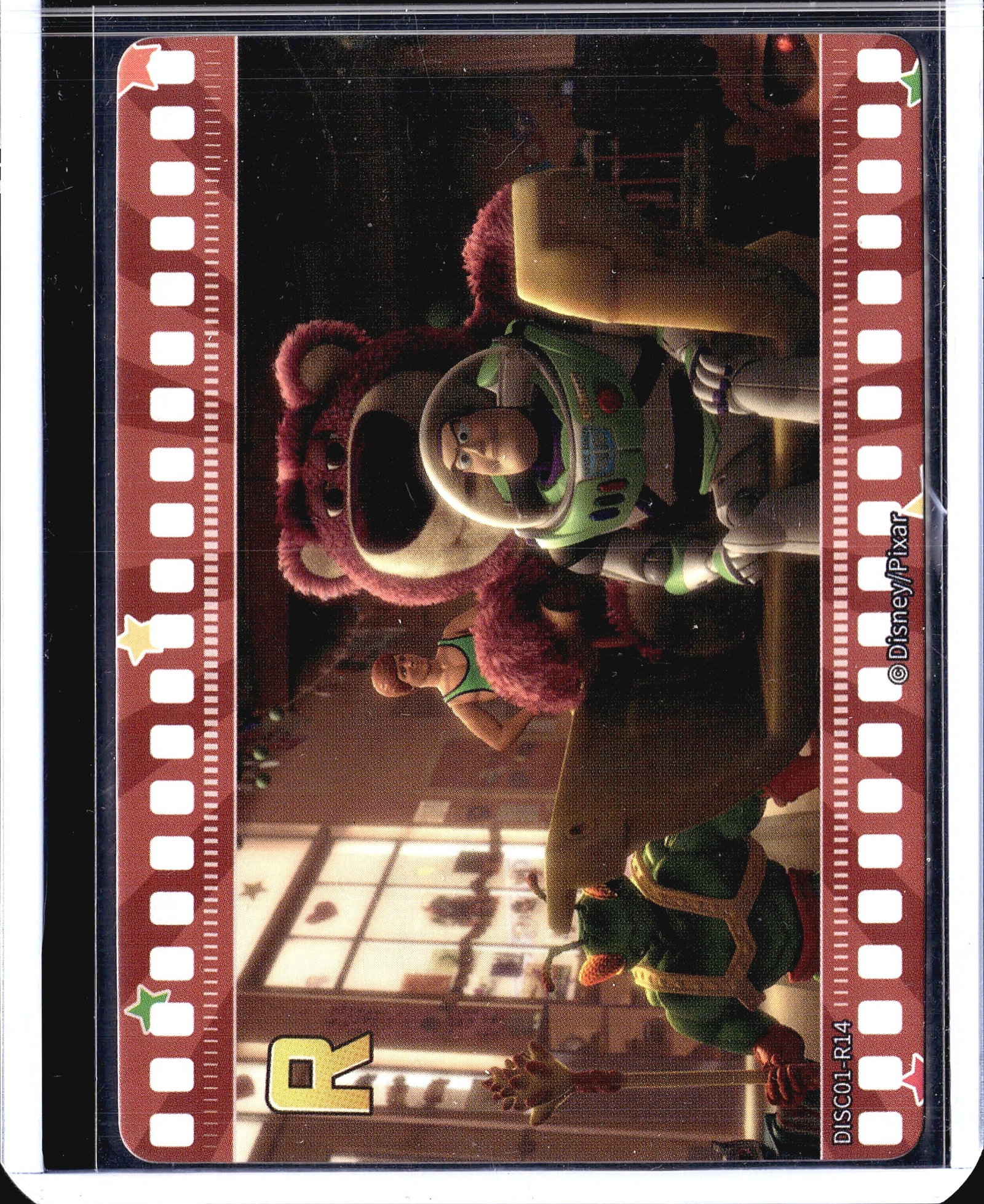 2023 Card Fun Disney 100 Series 1 Buzz Lightyear: This Disney/Pixar collectible card features Buzz Lightyear and Lotso from the beloved Toy Story franchise. The card is numbered DISC01-R14 and is presented in a film strip border design, consistent wi