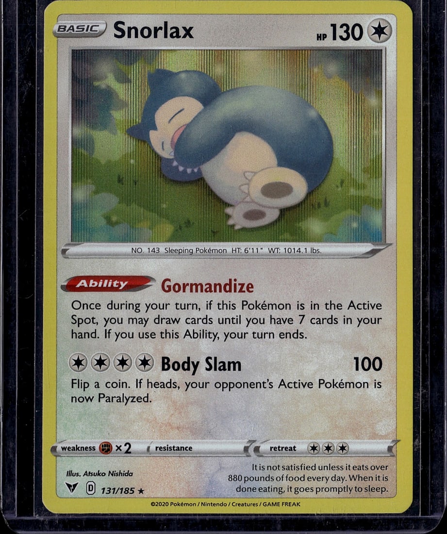 Snorlax 131/185 Sword & Shield Pokemon Card Singl: This is a raw Snorlax Pokemon trading card from the Sword & Shield set, card number 131/185. The card features the iconic sleeping Pokemon with its distinctive blue coloring and features the