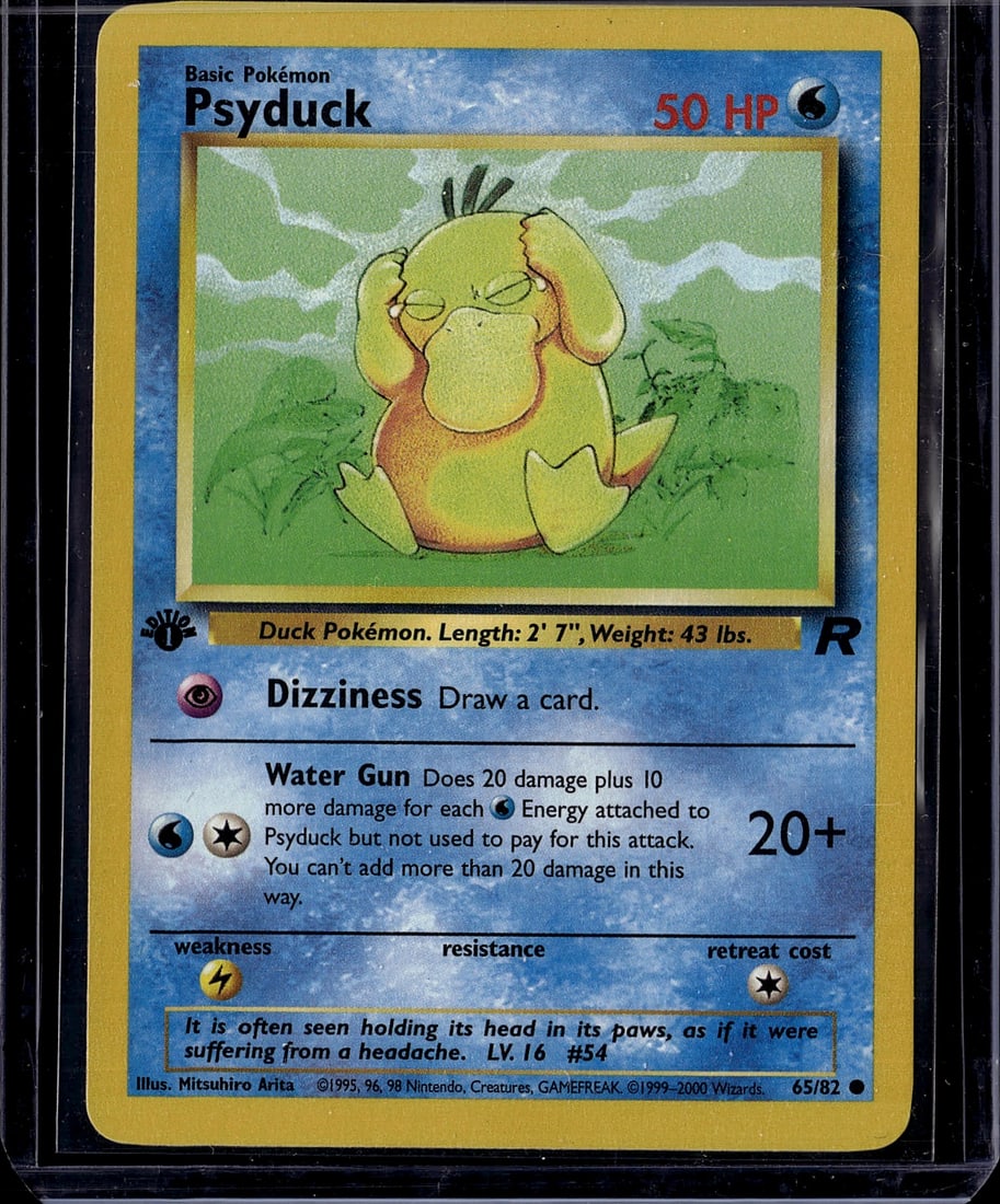 1999 Pokemon Base Set Psyduck Card #54/82 - Vinta: This is an original 1999 Pokemon Base Set Psyduck card, card number 54 out of 82 from the foundational Base Set released by The Pokemon Company and Wizards of the Coast. This Basic Psychic-type Pokemo