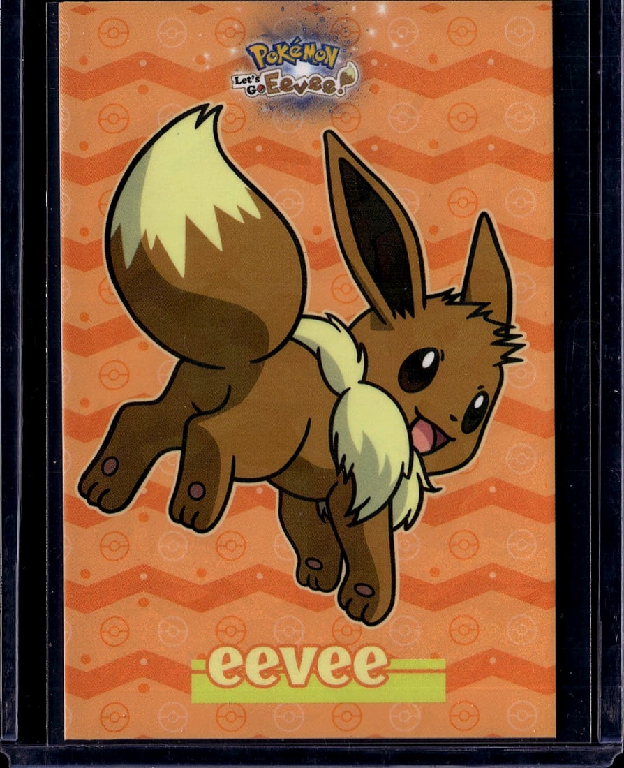 Pokemon Let's Go Eevee Official Card - Mint Condi: This is an official Pokemon Let's Go Eevee collectible card featuring the beloved Eevee character in vibrant color artwork. The card showcases Eevee in a dynamic pose against an orange wave-patterned 