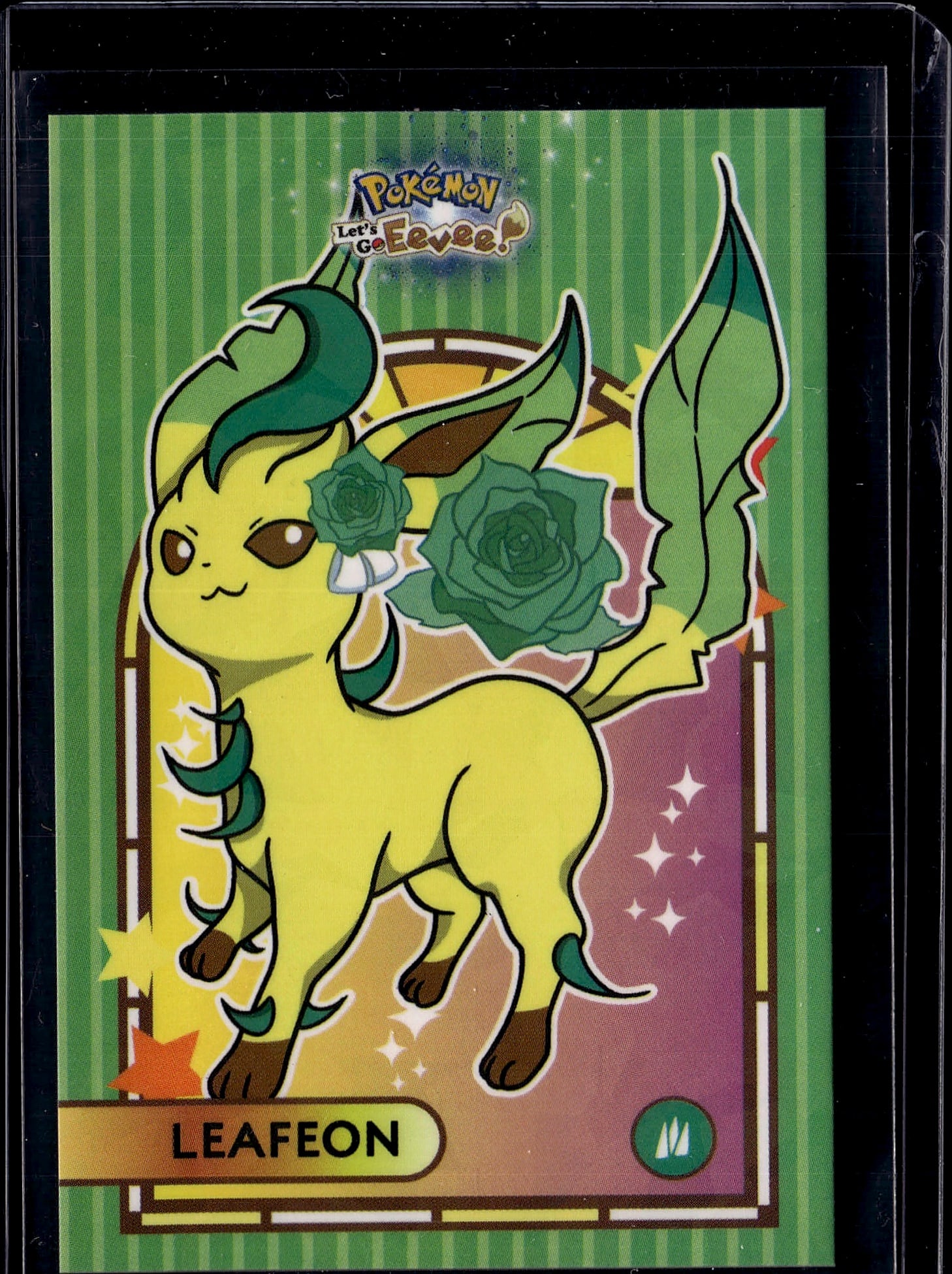 2022 Pokemon Let's Go Eevee Leafeon Database Peru: This is a Leafeon card from the 'Let's Go Eevee' Database series, a third-party regional product manufactured in Peru featuring Eevee and its Eeveelution evolutions with a Cracked Ice Holo finish.