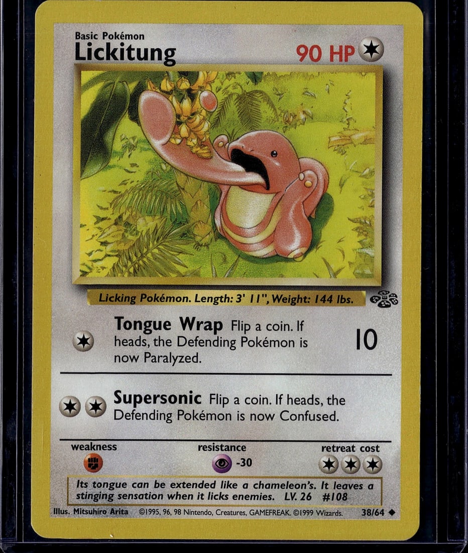 Lickitung 38/64 Base Set 1995 Pokemon Card - Raw: This is an authentic Lickitung Pokemon Trading Card from the iconic 1995 Base Set, produced by Wizards of the Coast. Card #38/64 features the classic licking Pokemon with its distinctive extended tong