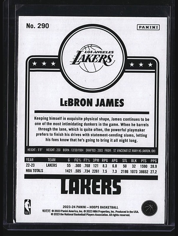 2023-24 Panini NBA Hoops #290 LeBron James Mint B: 2023 Panini Hoops Basketball #290 featuring LeBron James of the Los Angeles Lakers. This raw single card displays LeBron in his Lakers uniform during game action. The card showcases the classic Hoops