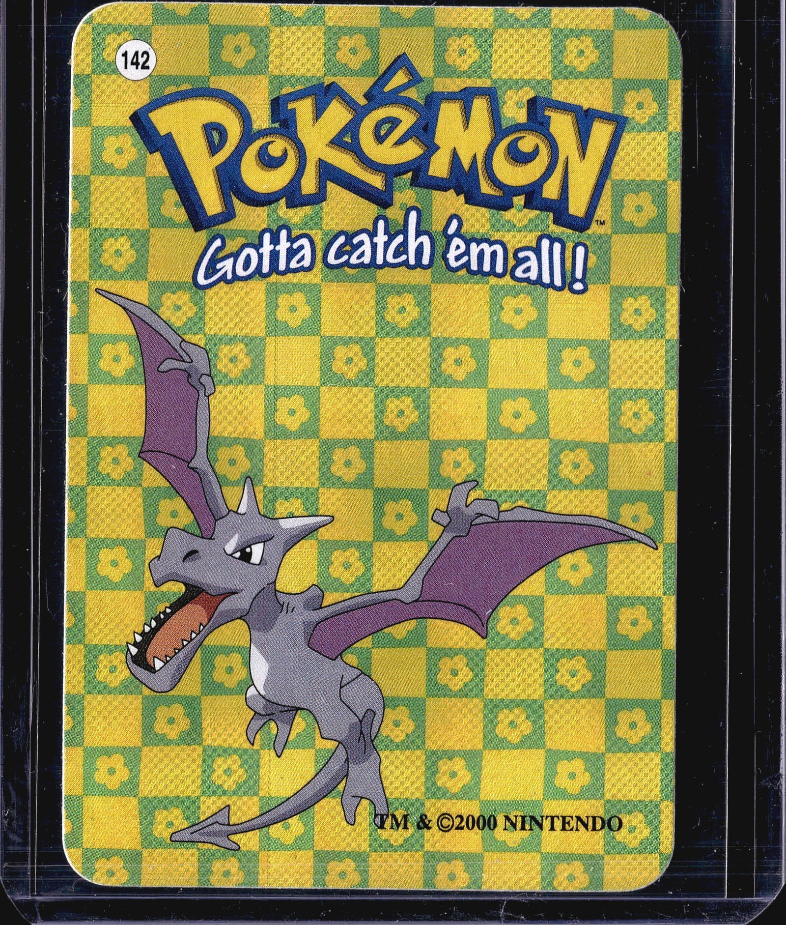 1-Card Vintage Pokemon #142 Trading Card TCG 2000: This is a single vintage Pokemon trading card from the base era, printed in 2000 by Nintendo. The card features artwork of a dragon-type Pokemon character on a yellow and green checkered background. T