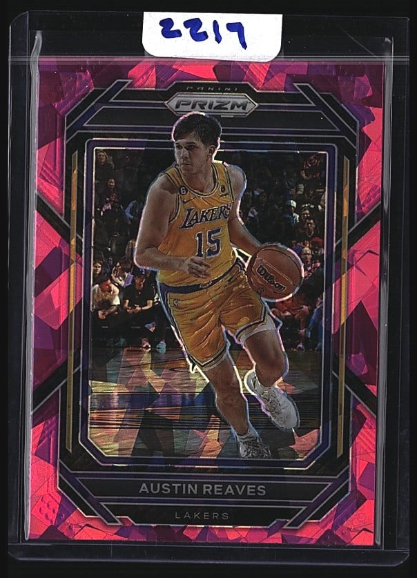 2022 Panini Prizm Austin Reaves Lakers Basketball: 2022 Panini Prizm Basketball card featuring Austin Reaves of the Los Angeles Lakers wearing number 15. This raw single shows Reaves in action during gameplay. The card displays the distinctive Prizm