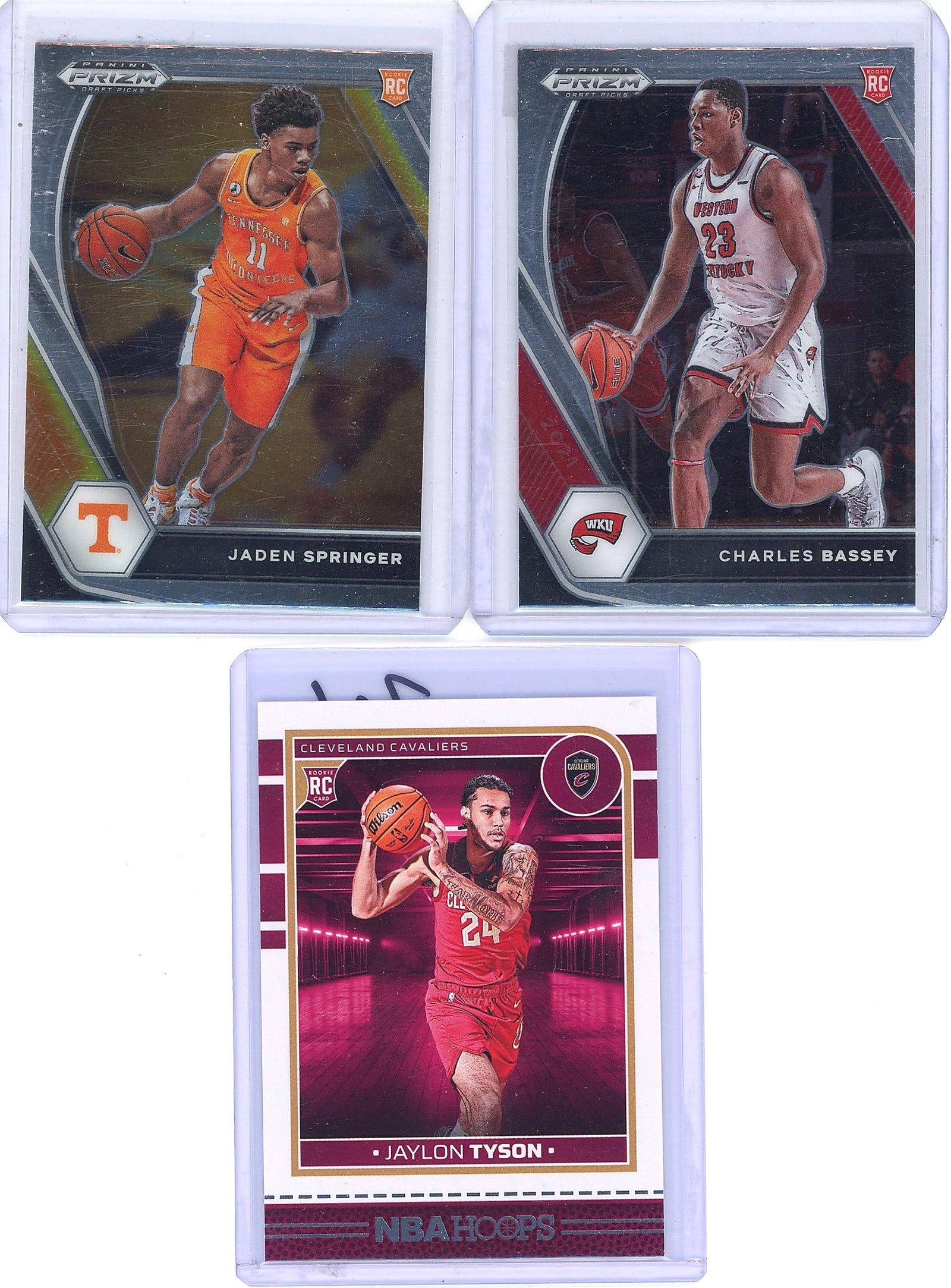 2021 Panini Prizm Basketball Lot - Springer: This lot contains three 2021 Panini Prizm basketball rookie cards featuring Jaden Springer (Tennessee #11), Charles Bassey (Western Kentucky #23), and Jaylon Tyson (Cleveland Cavaliers #24). All cards