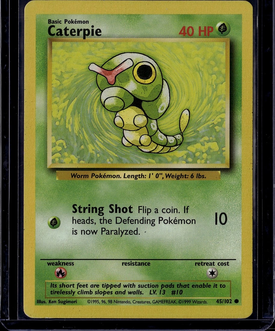 1999 Pokemon Base Set Caterpie #45/102 Card: This is an original 1999 Pokemon Trading Card Game Base Set Caterpie card, numbered 45/102. Caterpie is a Basic Grass-type Worm Pokemon featuring 40 HP and the iconic String Shot attack. The card