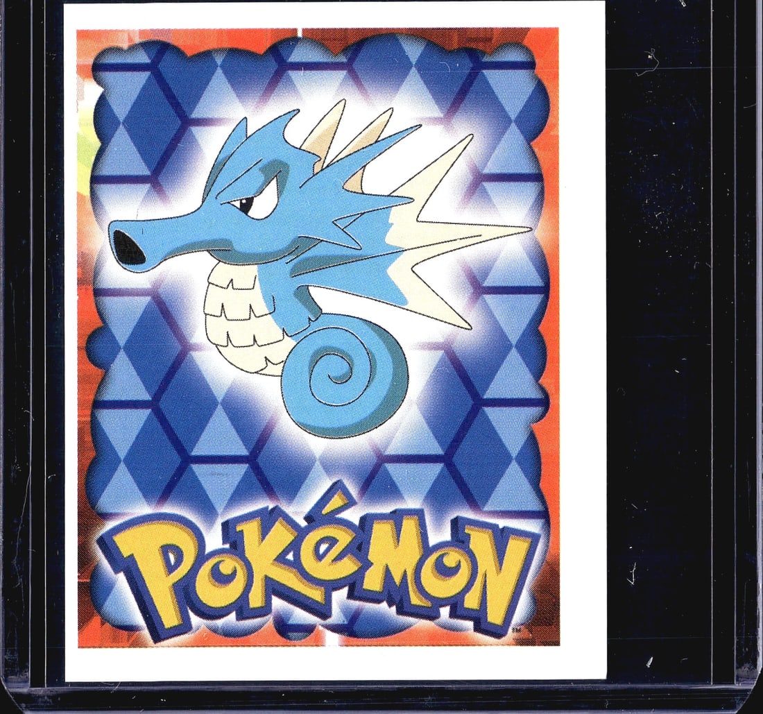 1999 Topps Merlin Pokemon Sticker Collection: This is sticker #117 from the 1999 Merlin Pokemon Sticker Collection, an officially licensed Nintendo product produced by Merlin Collections. The front features Kingdra (the evolved form of Seadra)