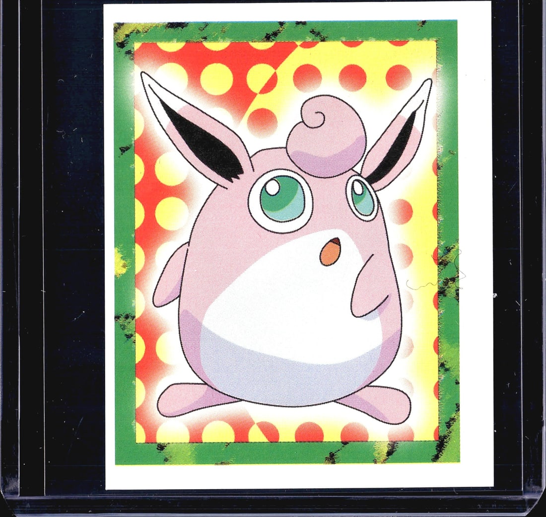 1999 Merlin Pokemon Collection Wigglytuff: This is a 1999 Merlin Collections Pokemon sticker featuring Wigglytuff, numbered #40 on the reverse. The front displays a colorful red, yellow, and green polka-dot background with a classic