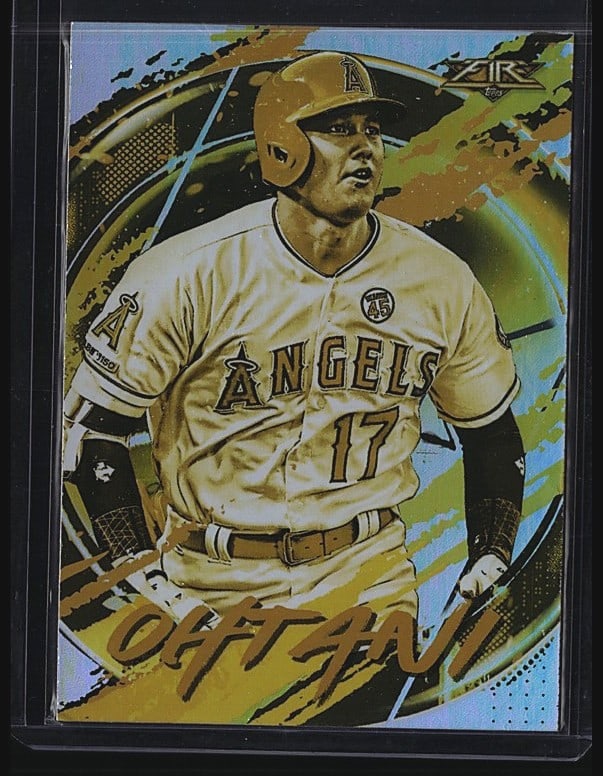 2020 Topps Fire Shohei Ohtani #49 Baseball Card: 2019 Topps Fire #49 Shohei Ohtani, Los Angeles Angels DH/UP. Raw single in near mint condition. Card features Ohtani in Angels uniform number 17 with dynamic action photography and Fire set design