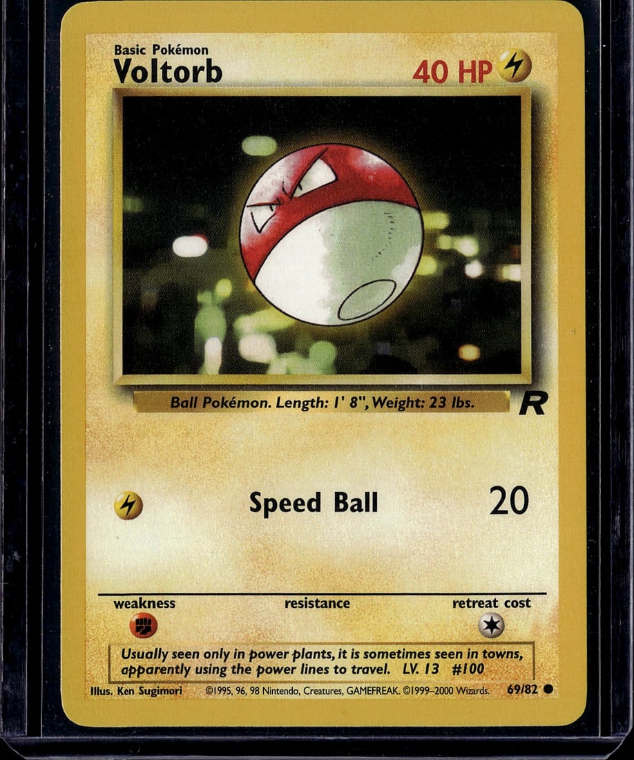 Voltorb Base Set 69/82 Pokemon Card 1999: This is an authentic Voltorb Pokemon trading card from the classic Base Set, released in 1999. Card number 69/82 features the iconic Ball Pokemon with its signature Lightning-type Speed Ball attack.