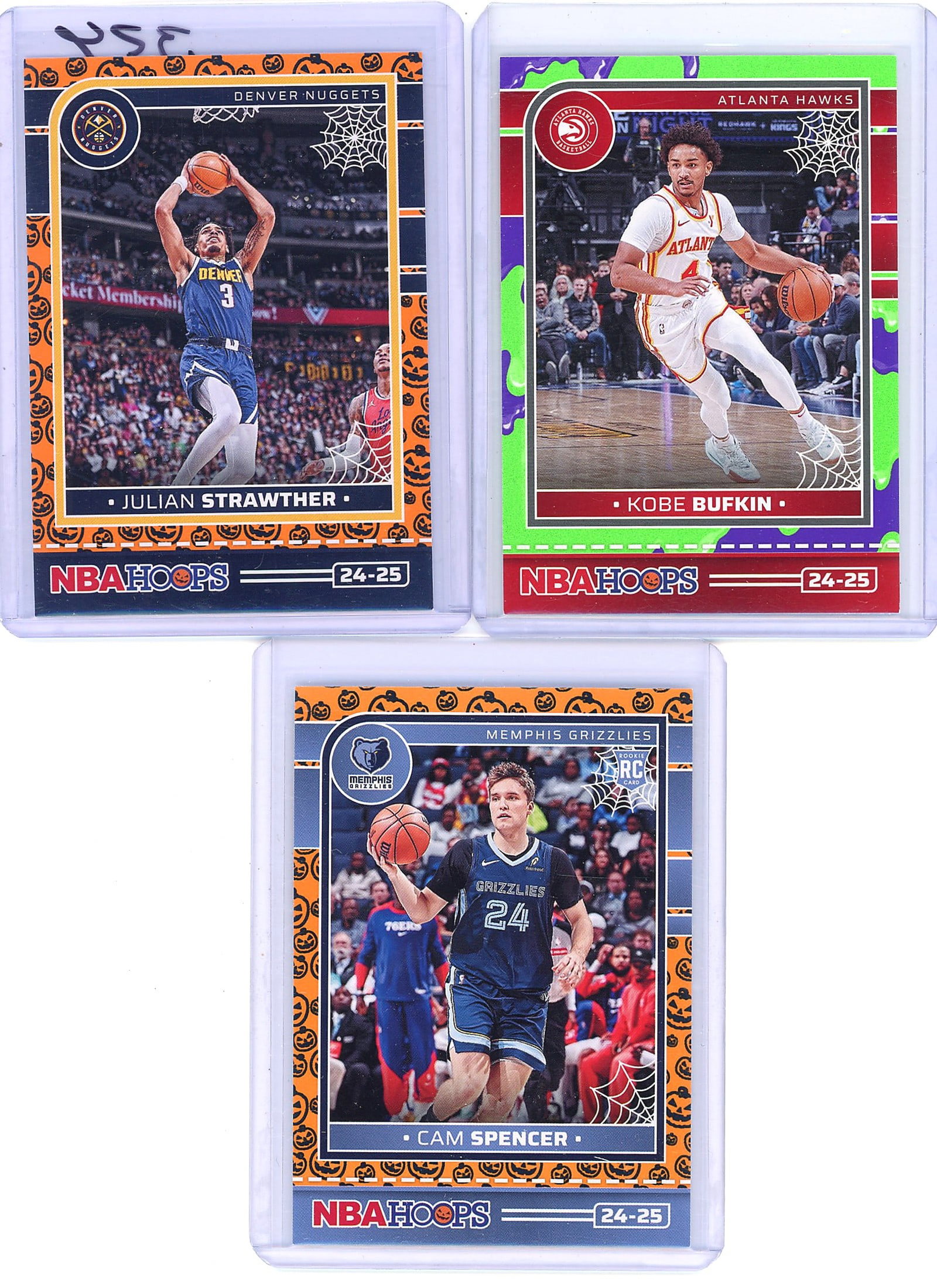 2024-25 Panini Haunted Hoops Orange Pumpkins: This lot contains three 2024-25 Panini NBA Hoops Haunted Hoops basketball cards in raw (ungraded) condition. Included are card #180 Julian Strawther (Denver Nuggets), card #184 Kobe Bufkin (Atlanta Ha