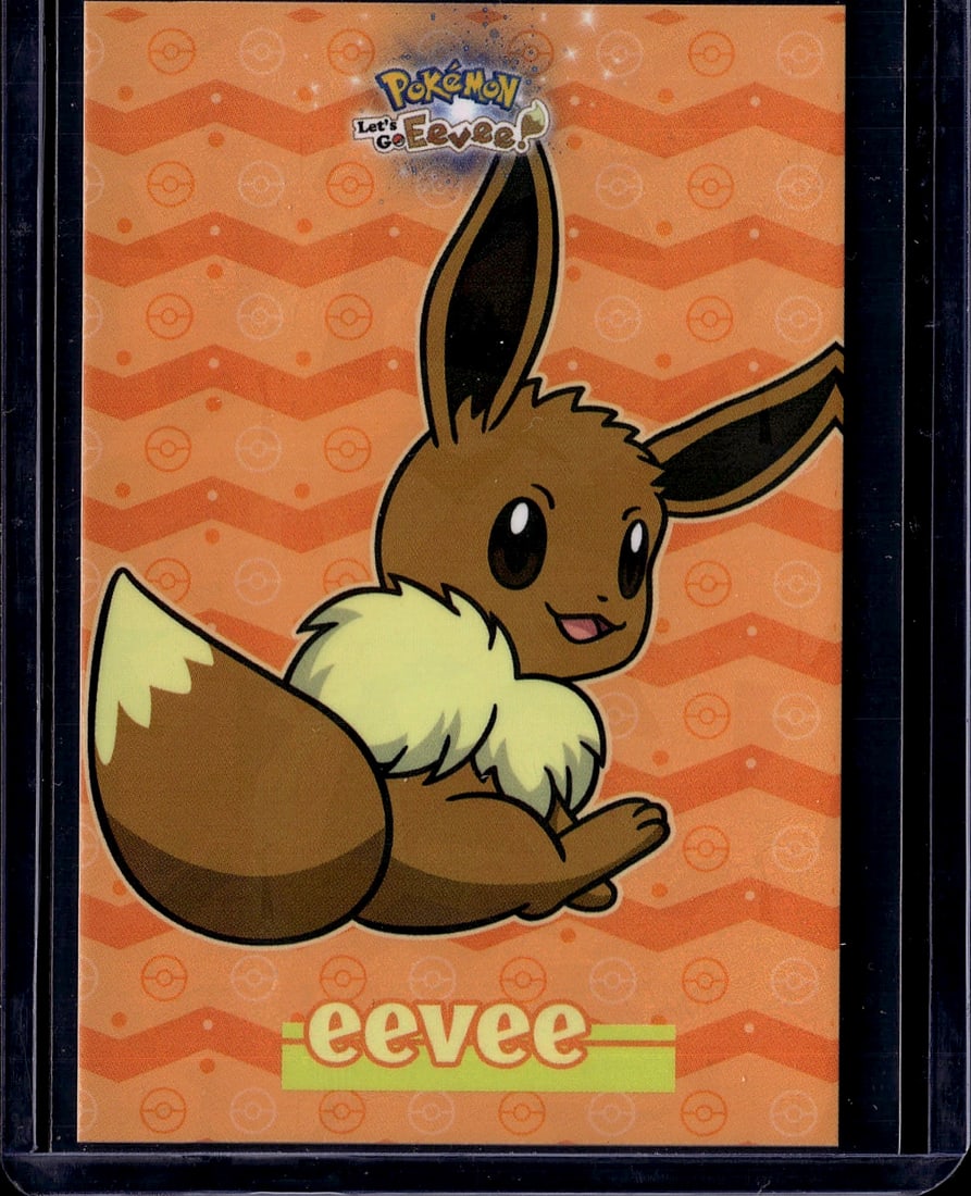 Pokemon Let's Go Eevee Promo Card - Near Mint: This is an official Pokemon Let's Go Eevee promotional card featuring the iconic Eevee character. The card showcases vibrant orange background artwork with Pokeball patterns and displays Eevee in its